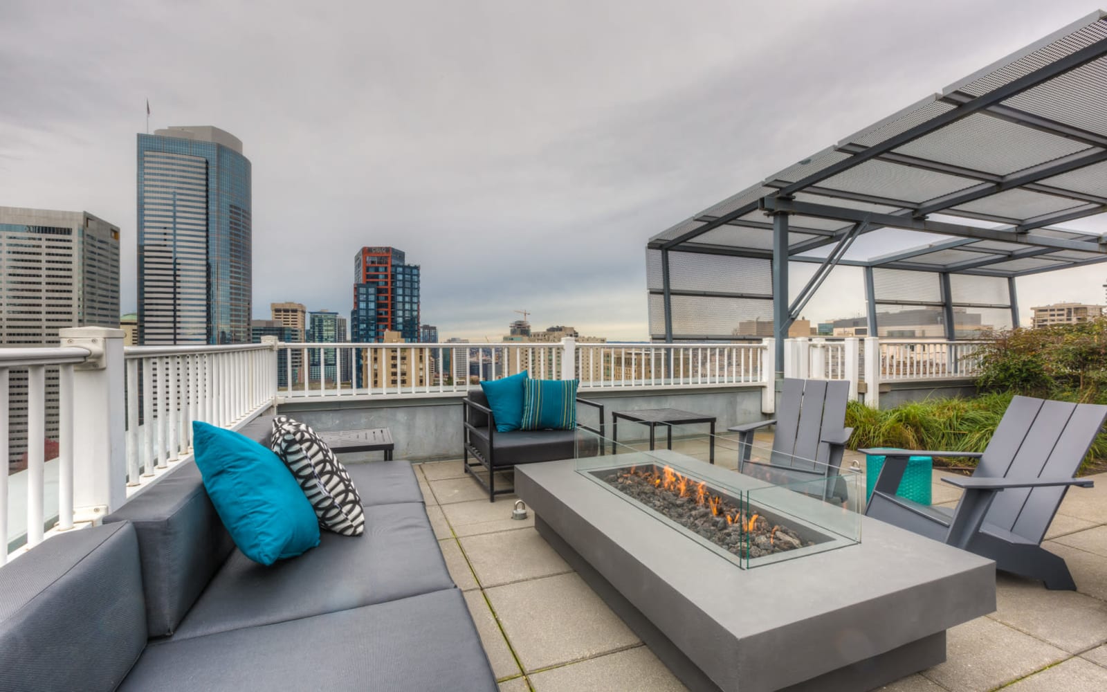 Rooftop patio seating and firepit at M Street in Seattle, Washington