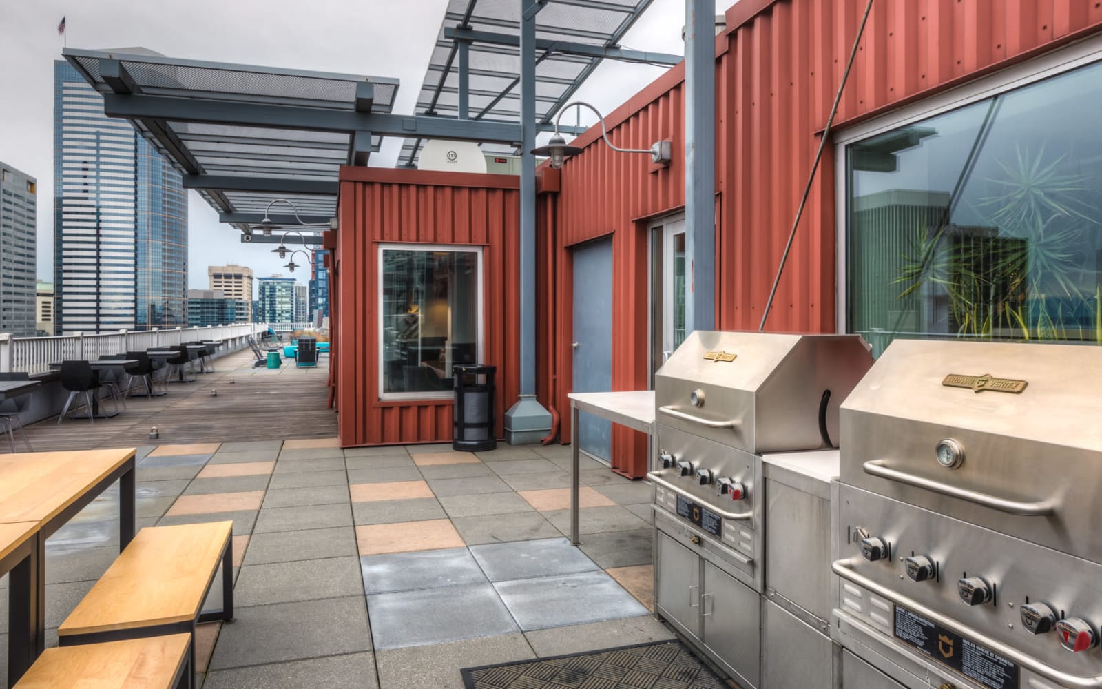 Outdoor rooftop cooking grill area at M Street in Seattle, Washington