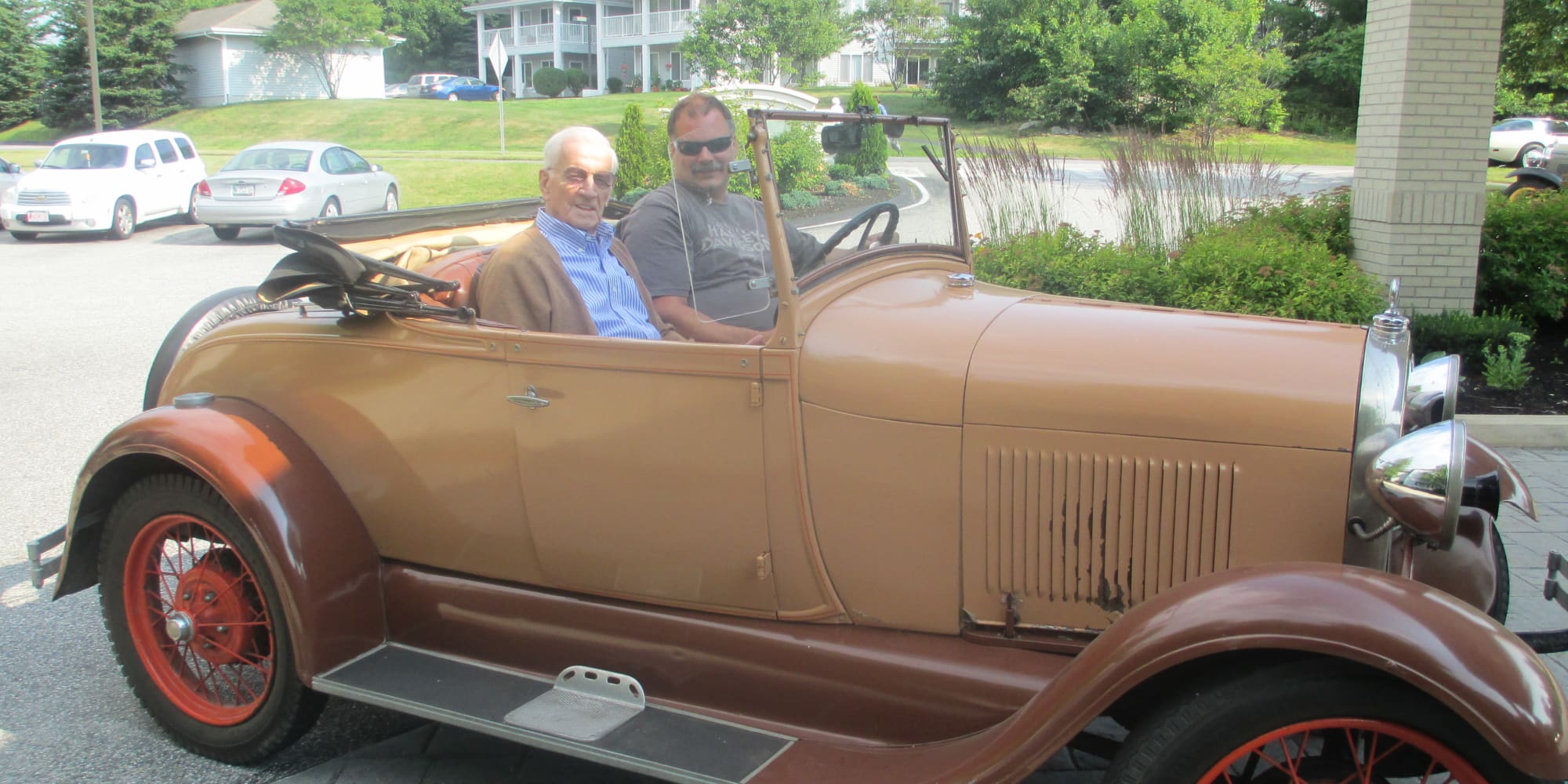 Residents in a classic car at Salishan Gracious Retirement Living in Spring Hill, Florida