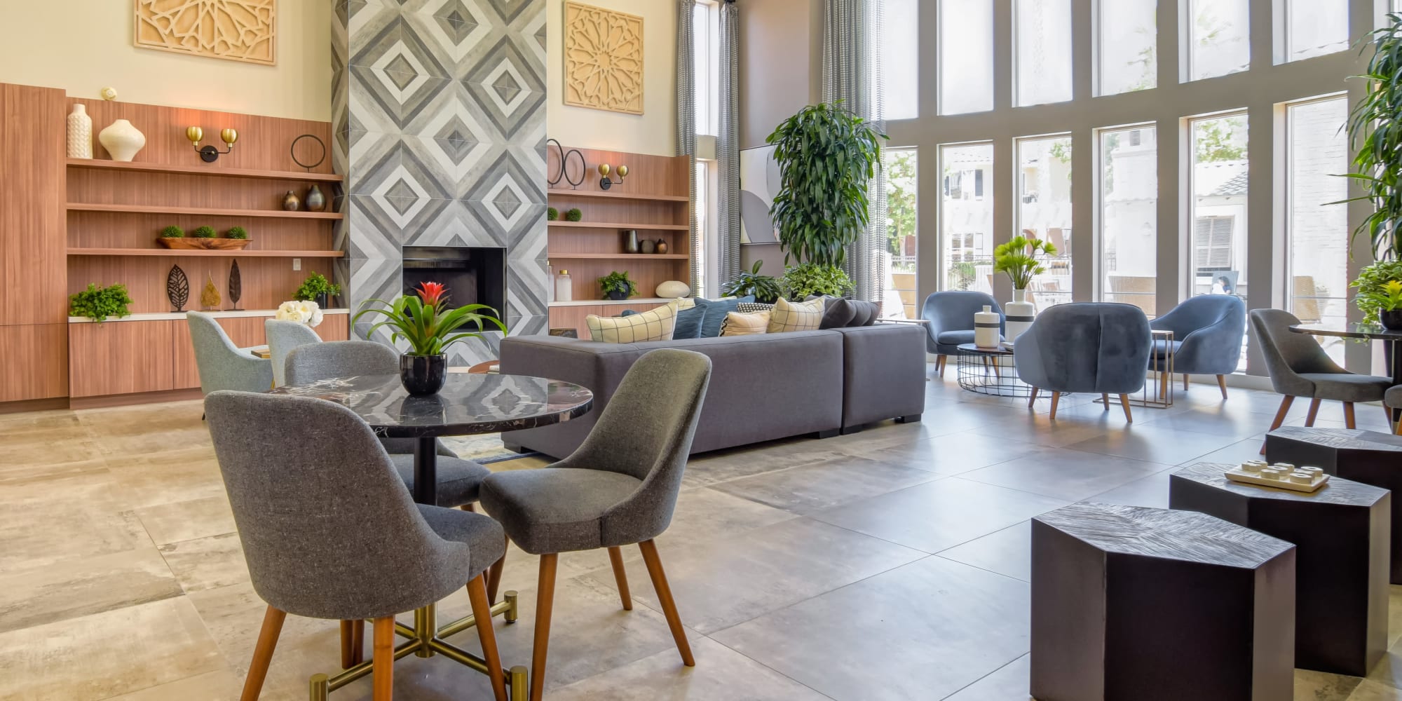 Lounge seating in front of the fireplace in the lobby at Sofi Shadowridge in Vista, California