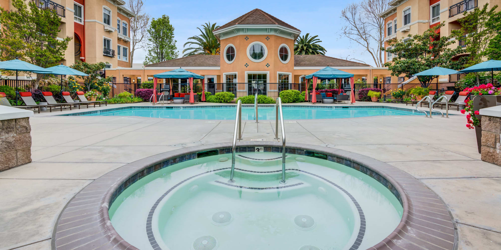 Hot tun near pool at at Villa Del Sol in Sunnyvale, CA