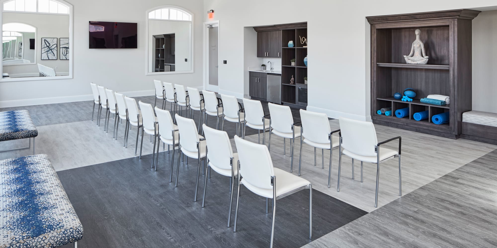 Exercise room with rows of chairs set up for a class at Blossom Ridge in Oakland Charter Township, Michigan