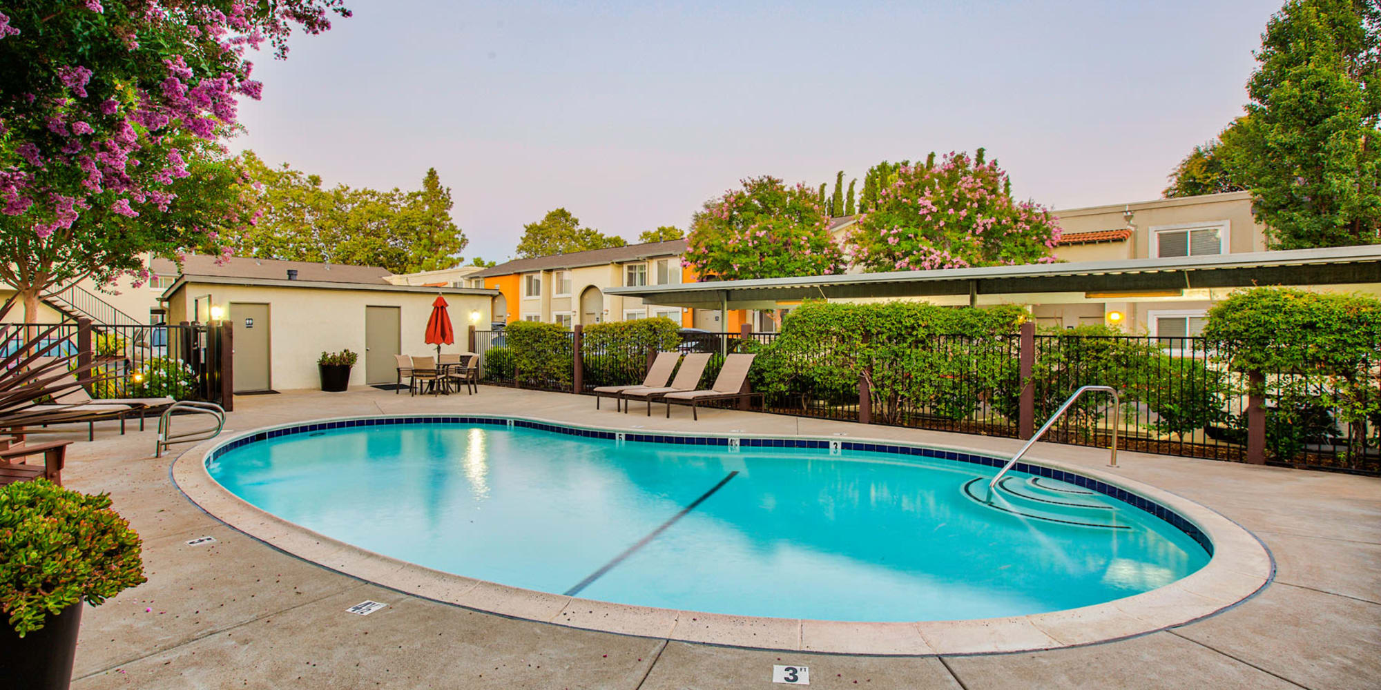 Serene morning at the pool at Pleasanton Place Apartment Homes in Pleasanton, California