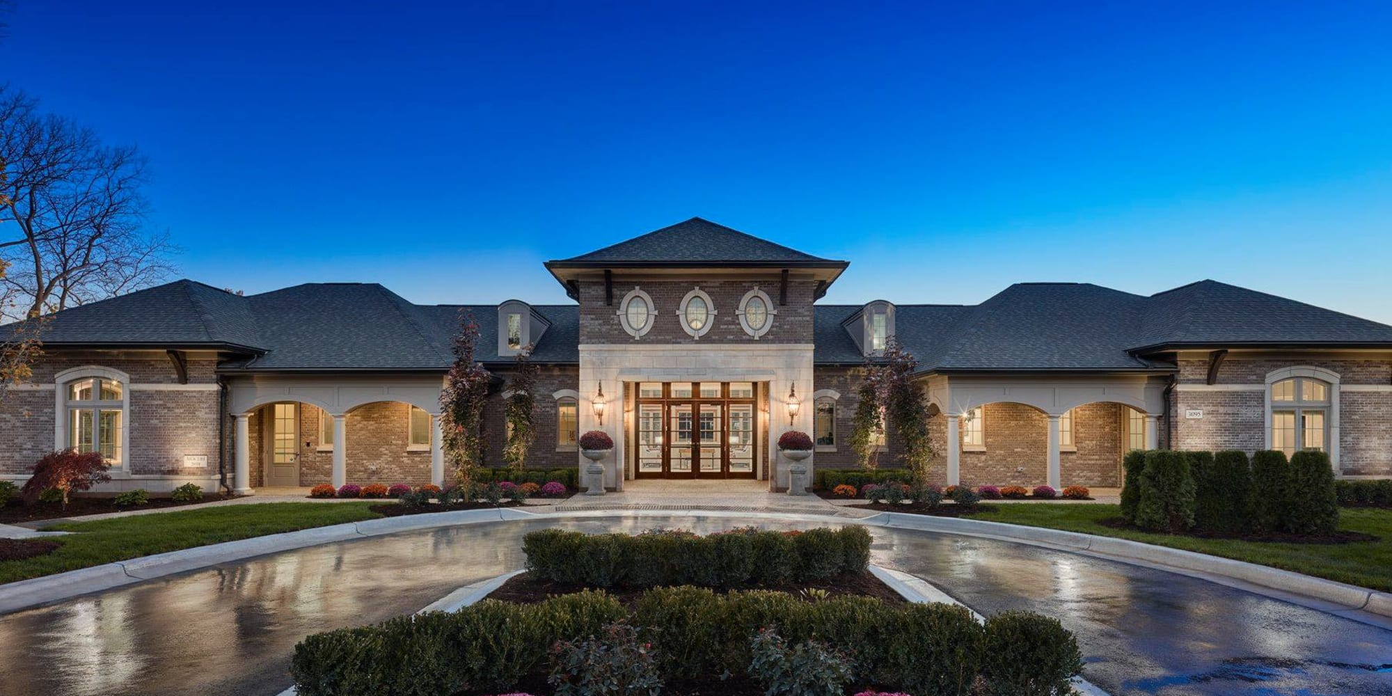 Exterior of building at night at Blossom Ridge in Oakland Charter Township, Michigan