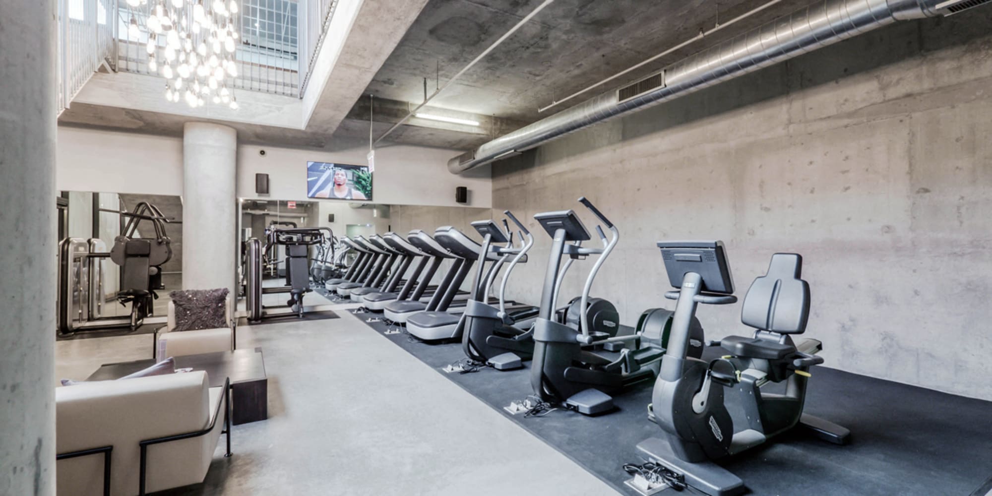 Cardio bikes in the fitness center at The Parker Fulton Market in Chicago, Illinois