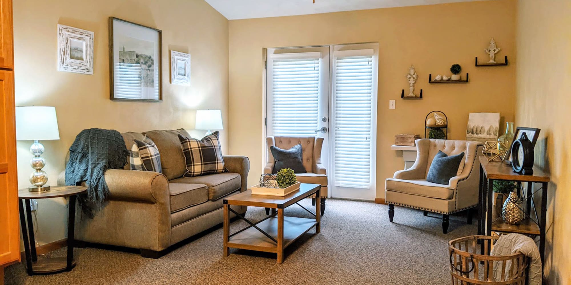 Model apartment living room at a Garden Place Senior Living community