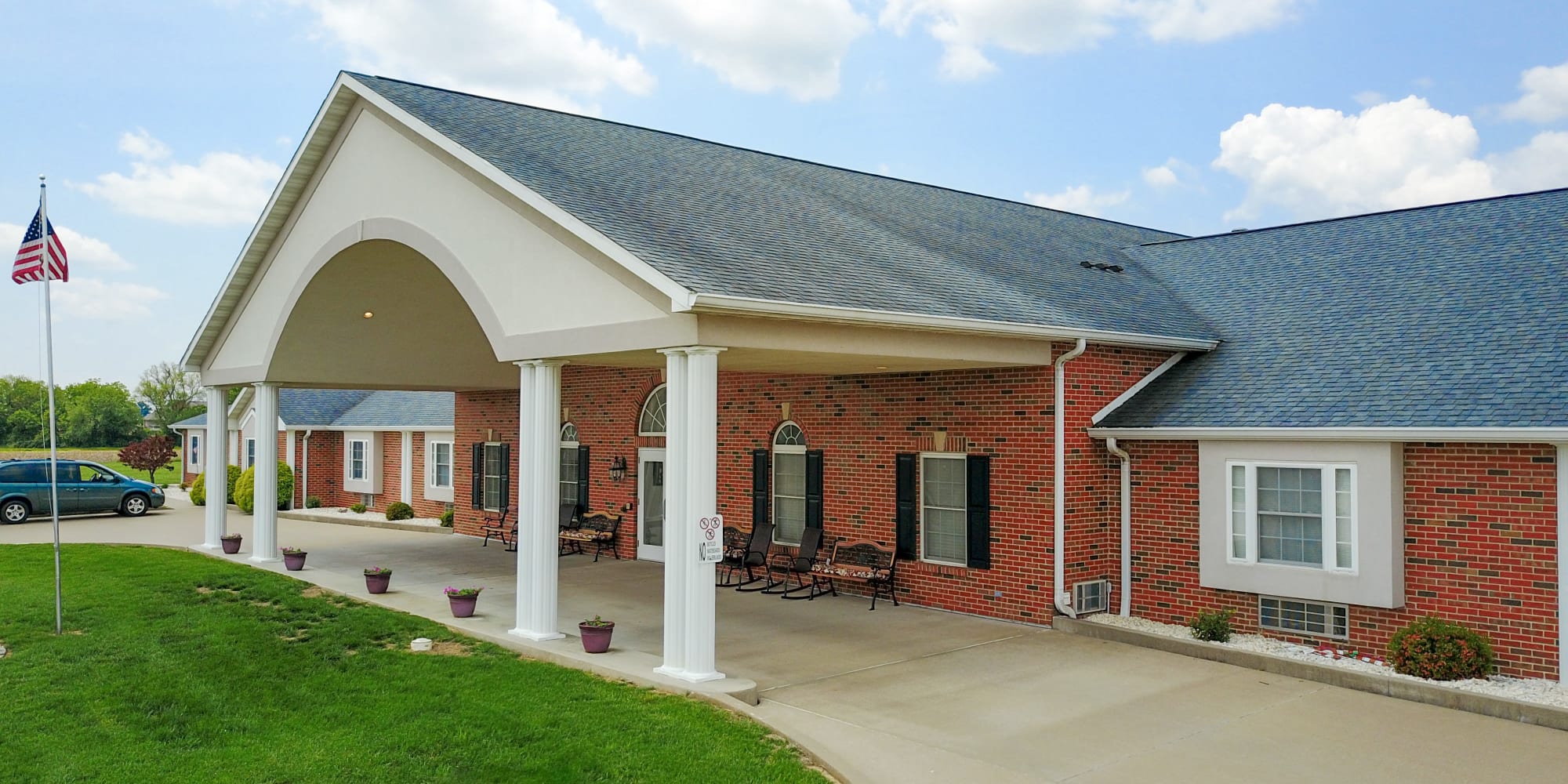 Front entrance and driveway at a Garden Place Senior Living community