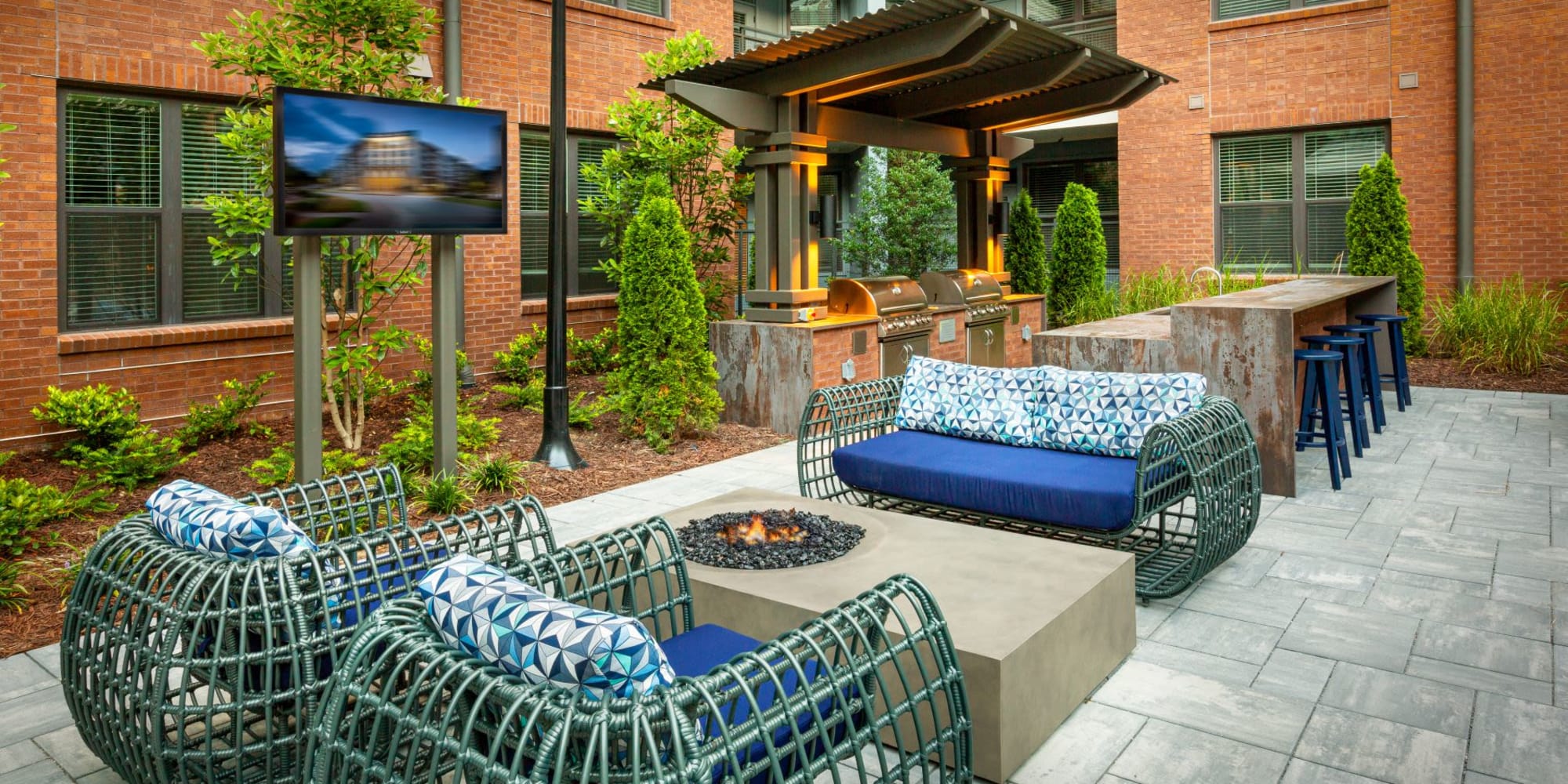 Lounge area with a fire pit at Revel Ballpark in Atlanta, Georgia