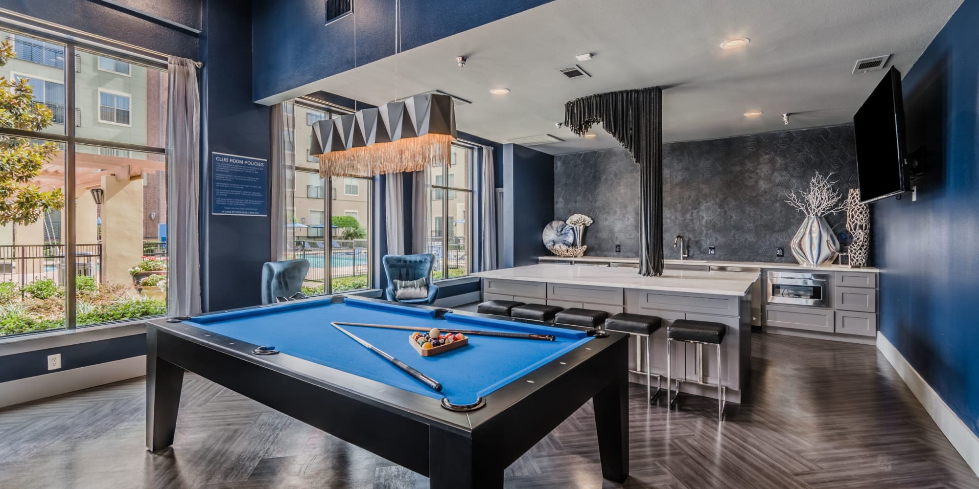 Apartments with a pool table at Olympus Boulevard