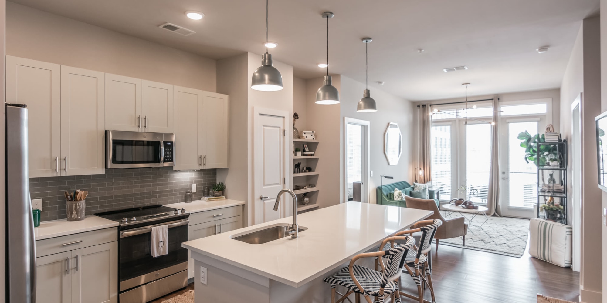 Stainless-steel appliances in a modern kitchen at The Guthrie North Gulch in Nashville, Tennessee