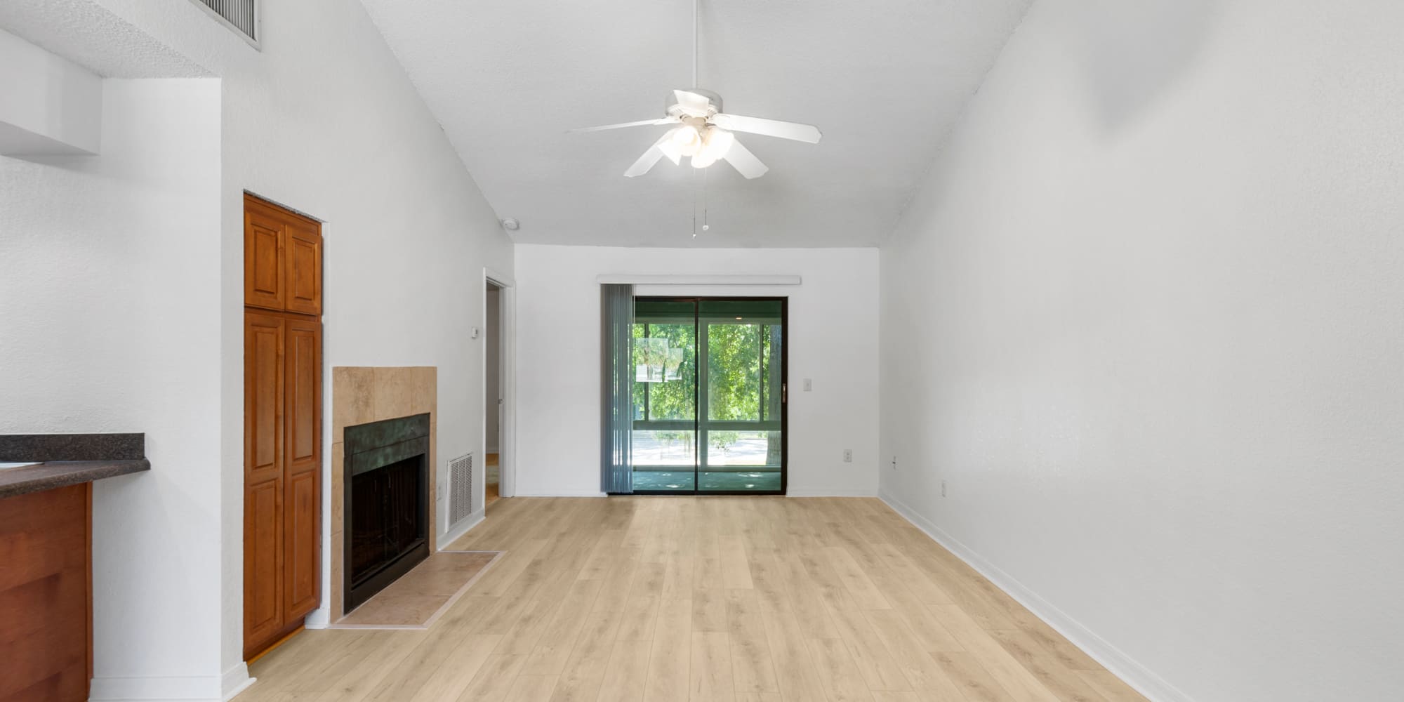 Fireplace and ceiling fan at Stone Creek at Wekiva in Altamonte Springs, Florida