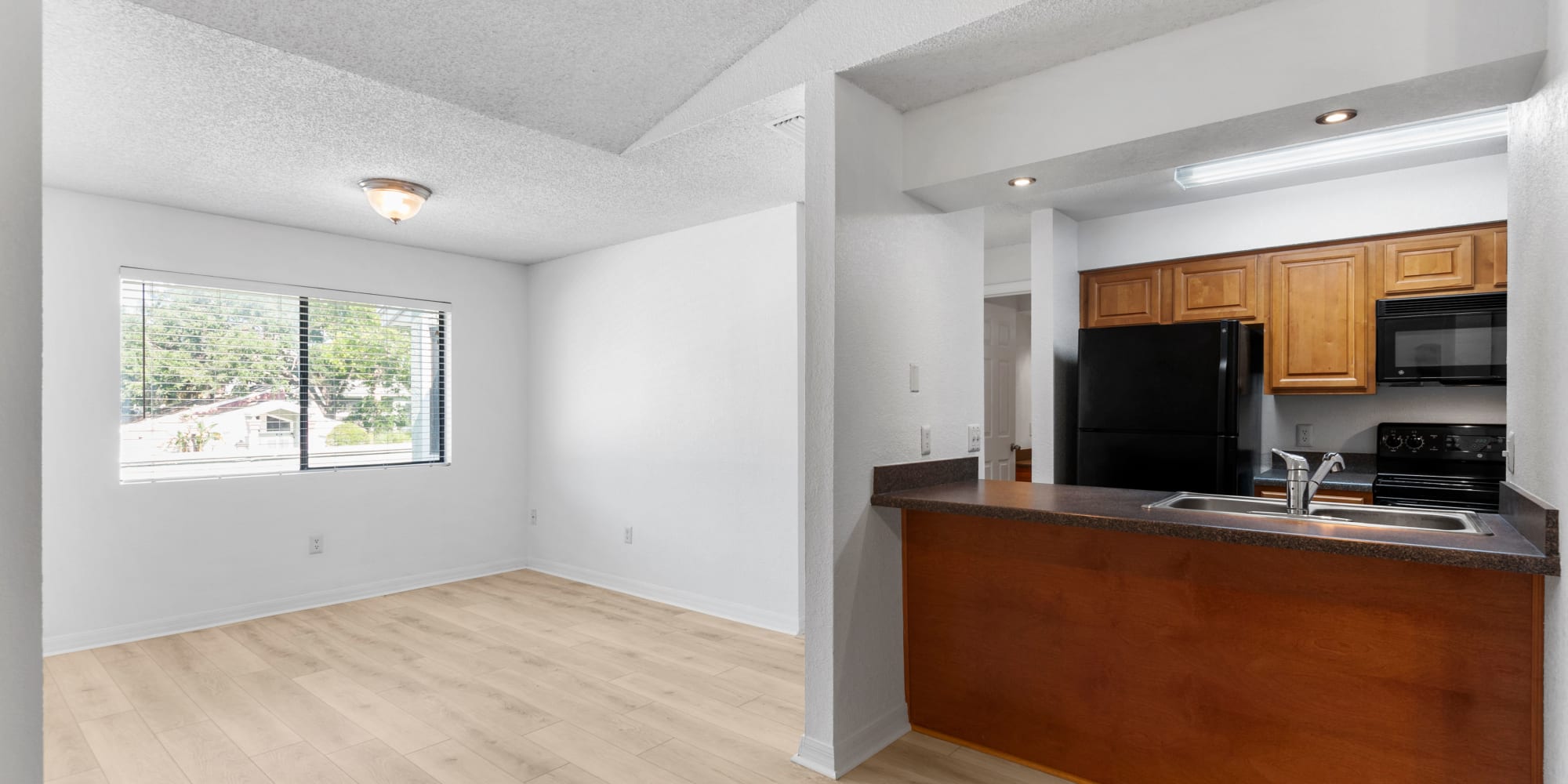 Wood-style flooring in an apartment at Stone Creek at Wekiva in Altamonte Springs, Florida