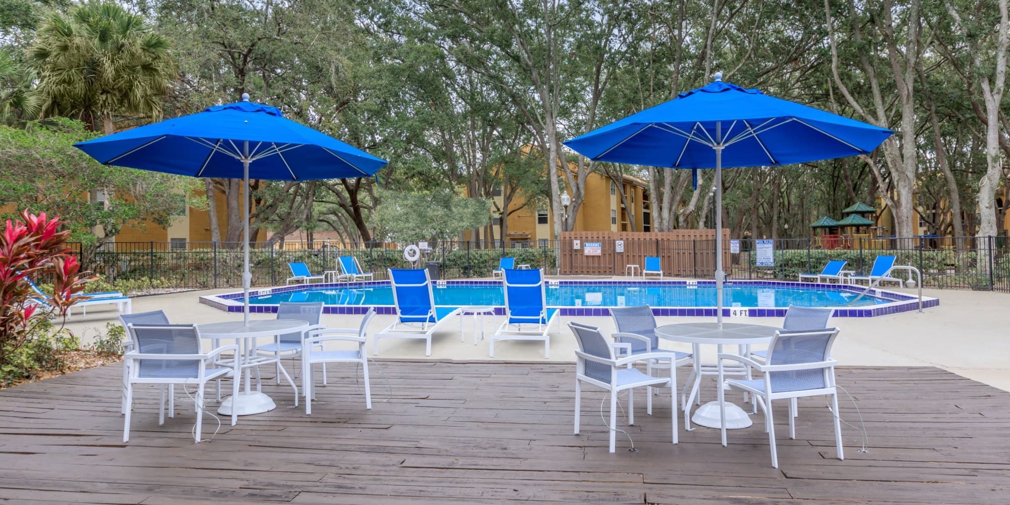 Picnic area by the pool at Images Condominiums in Kissimmee, Florida