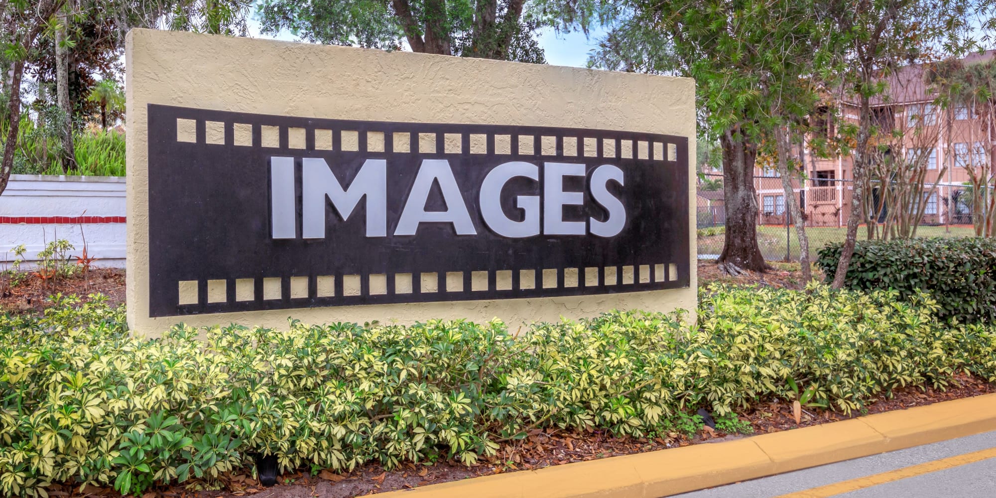 Entrance sign at Images Condominiums in Kissimmee, Florida