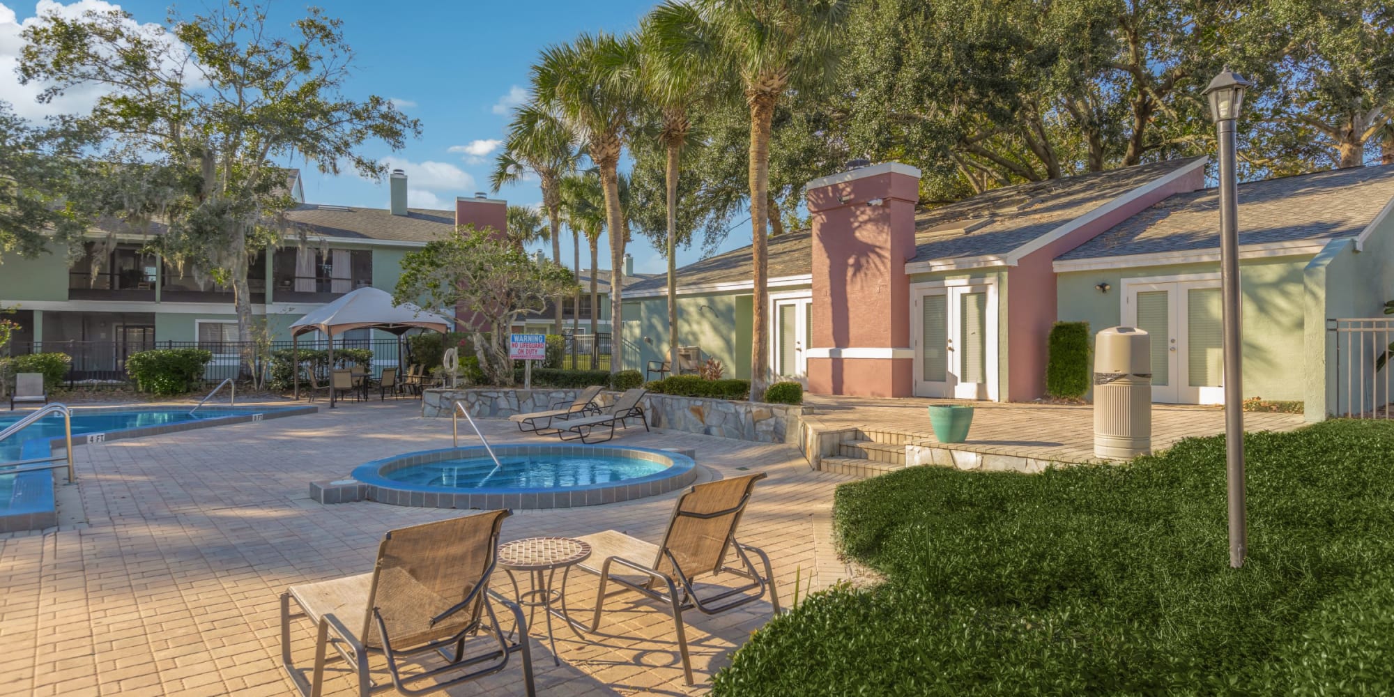 Lounge chairs by the pool at Stone Creek at Wekiva in Altamonte Springs, Florida