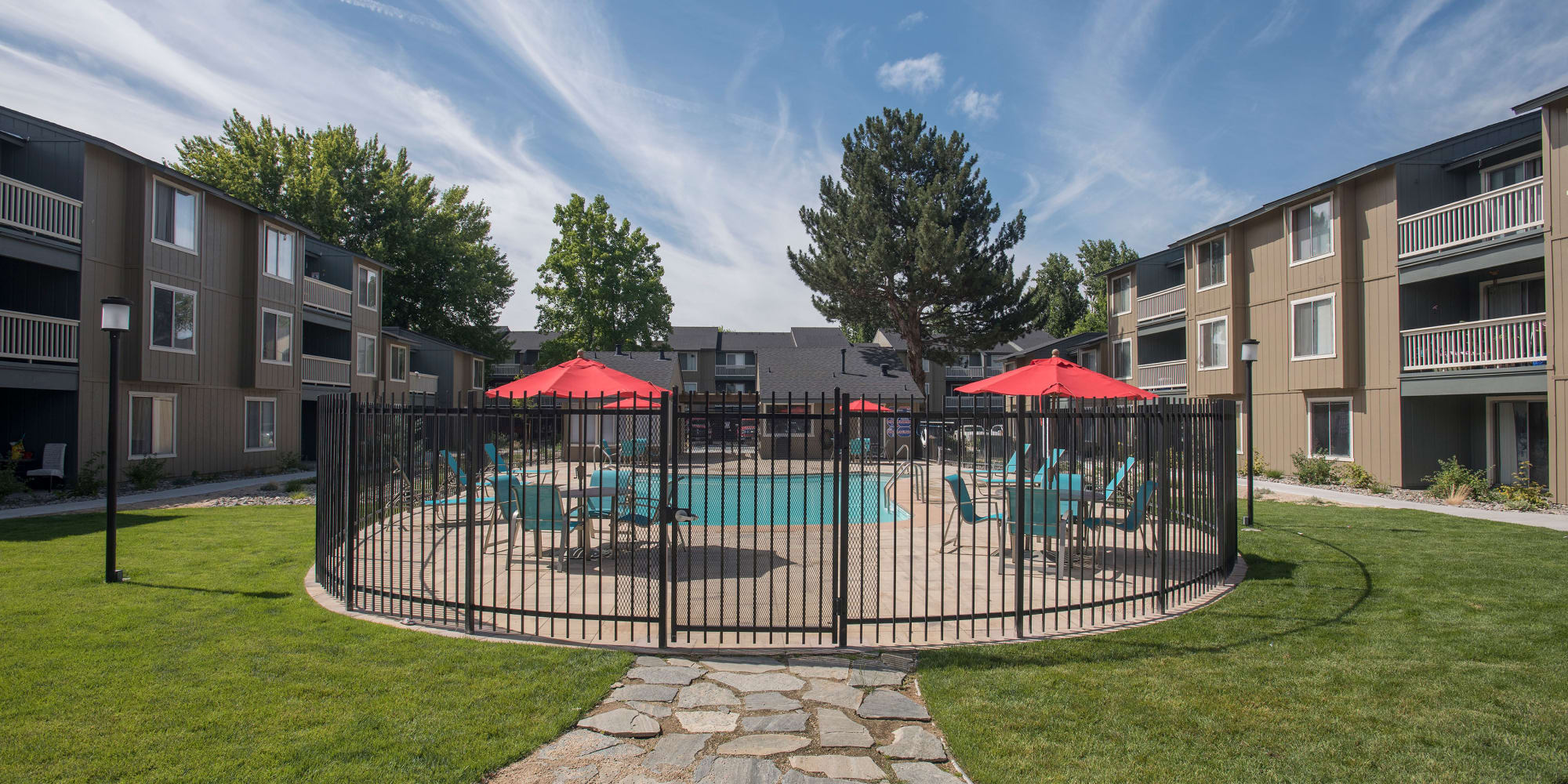 Fenced swimming pool at Keyway Apartments in Sparks, Nevada