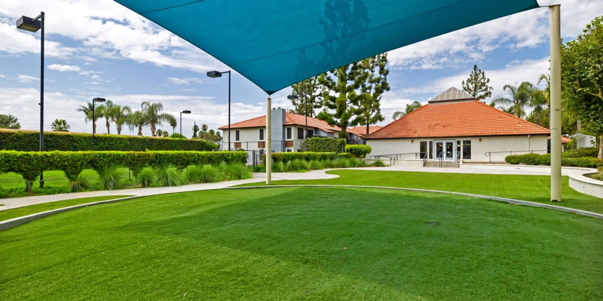 Shaded lawn at Trails at Grand Terrace in Colton, California