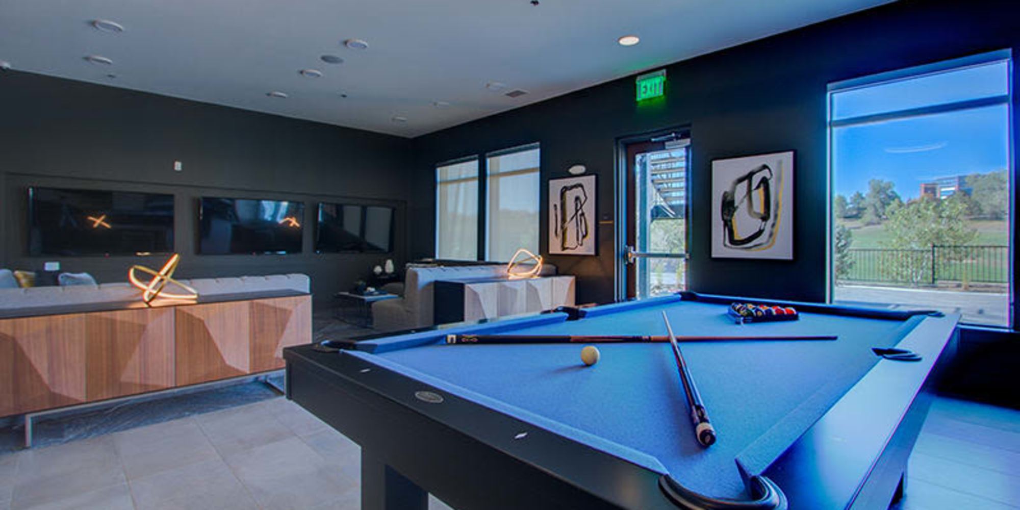 Pool in the game room at Fusion 355 in Broomfield, Colorado