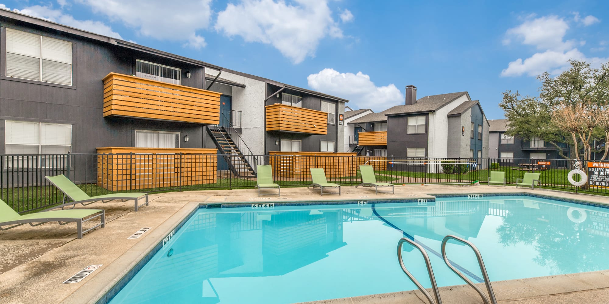Swimming pool at Emmitt Luxury Apartments in Haltom City, Texas