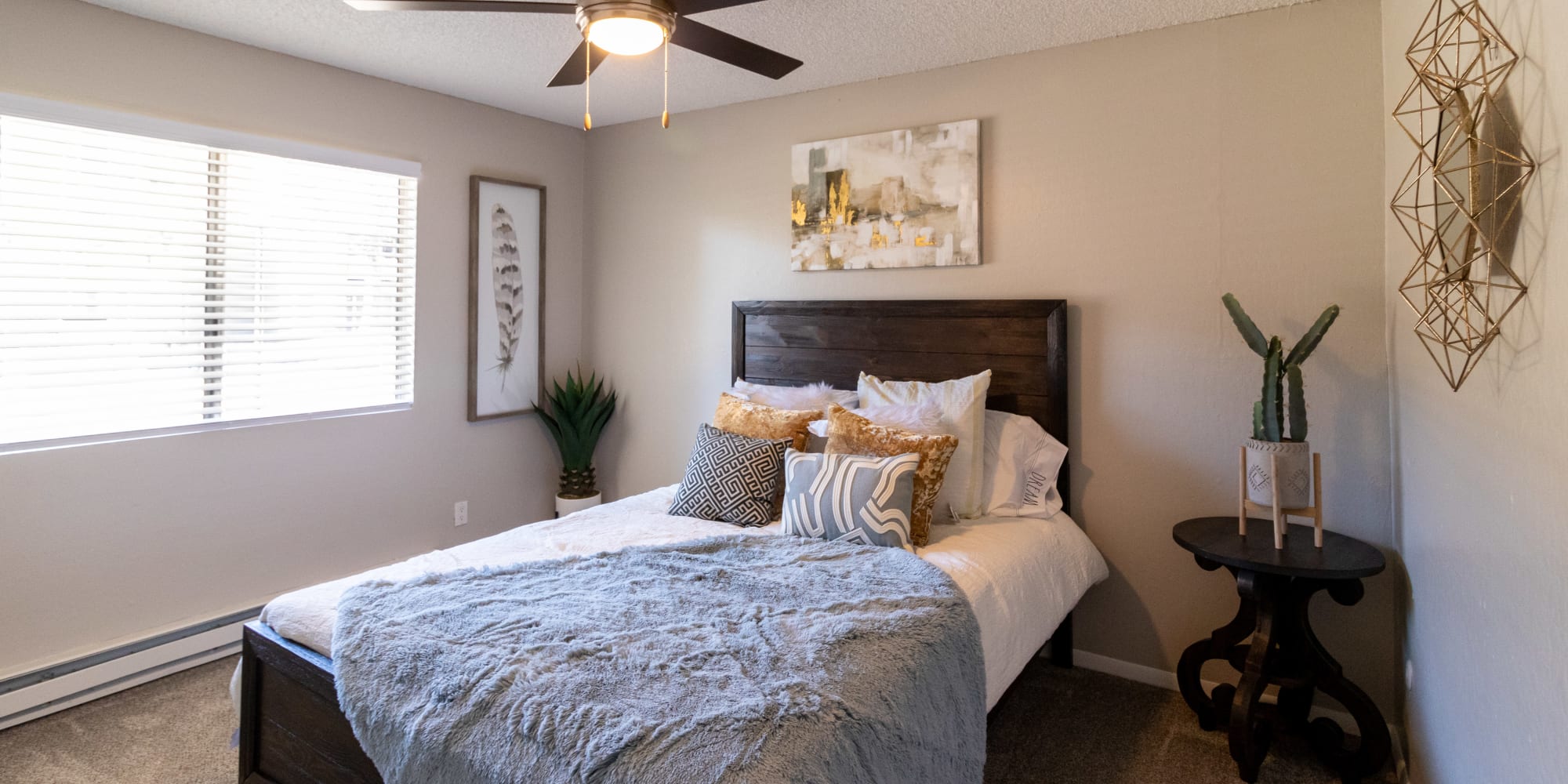 Bedroom with large window at Keyway Apartments in Sparks, Nevada