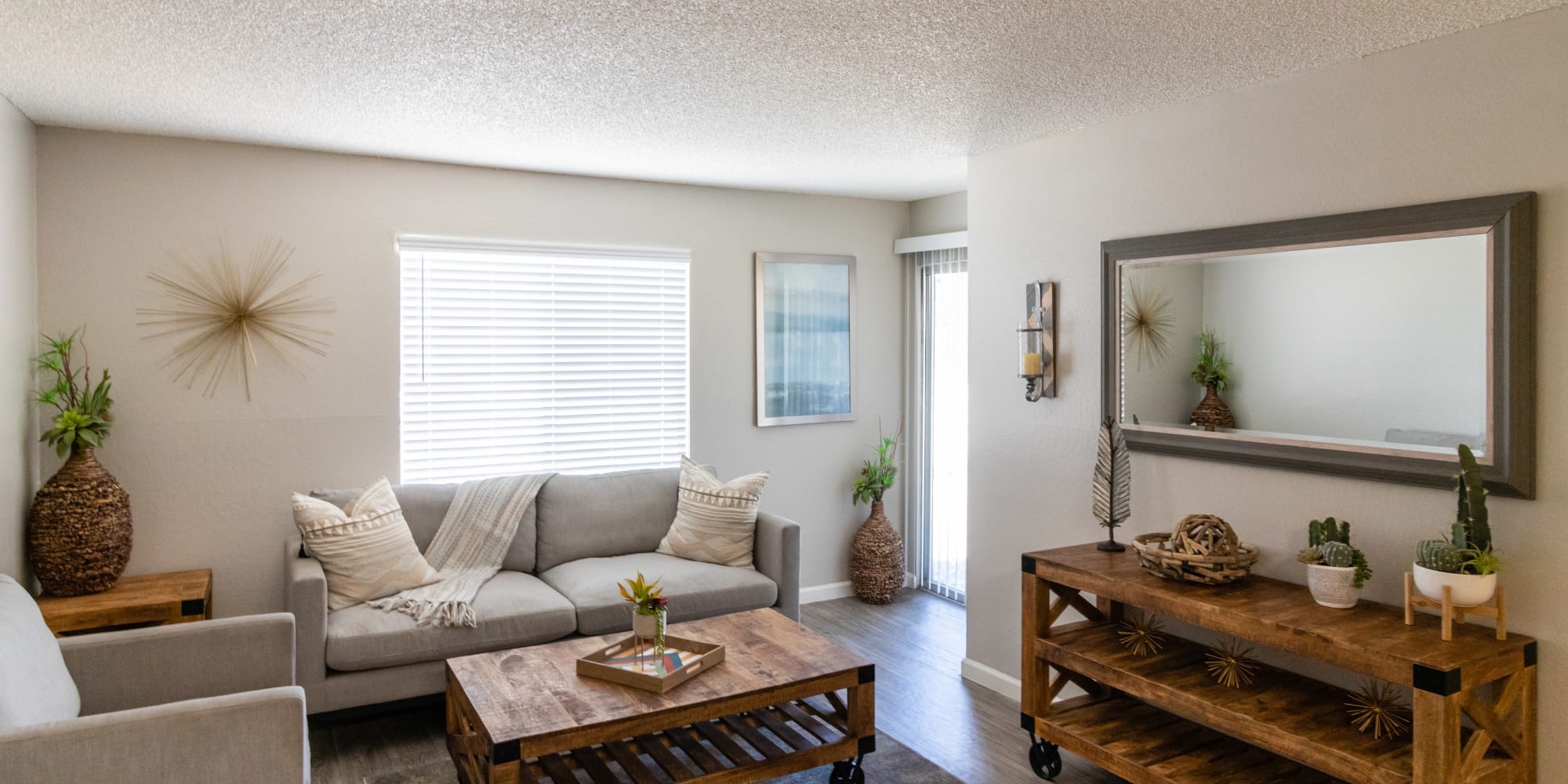 Living room with window at Keyway Apartments in Sparks, Nevada