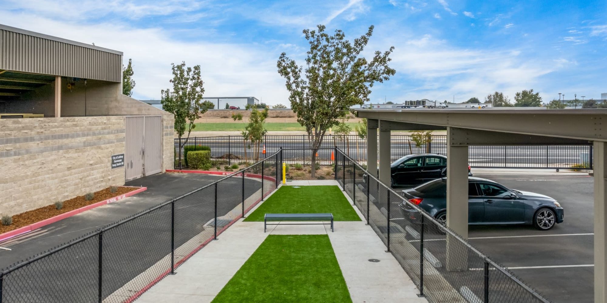 Small fenced dog park at Towne Centre Apartments in Lathrop, California