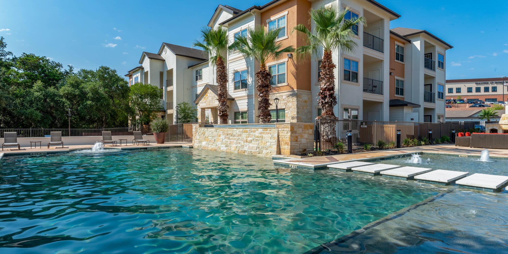 Exterior of building with pool at Alannah at Westover Hills in San Antonio, Texas
