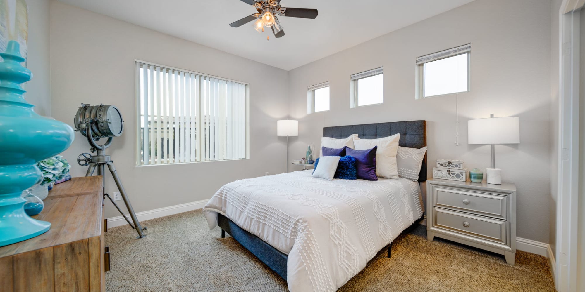 Bedroom with lots of windows at The Trails at Pioneer Meadows in Sparks, Nevada