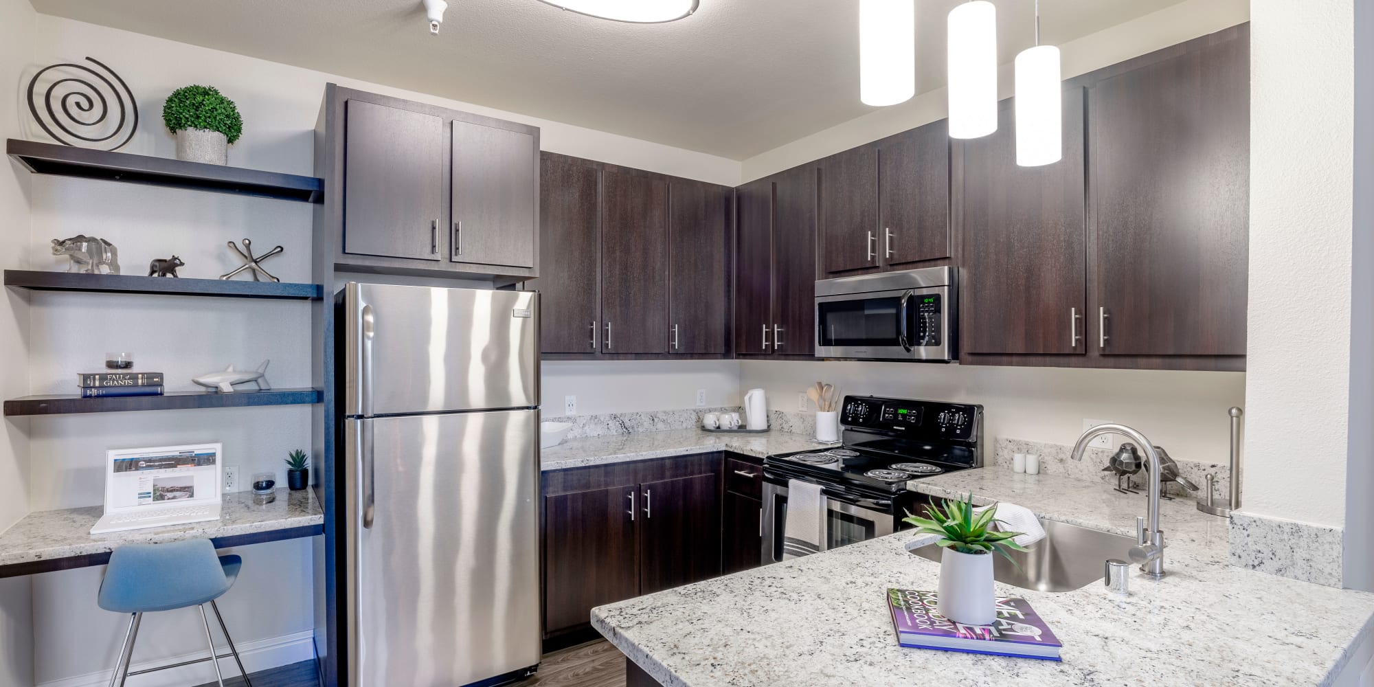 Kitchen with prep island at Villagio Luxury Apartments in Sacramento, California