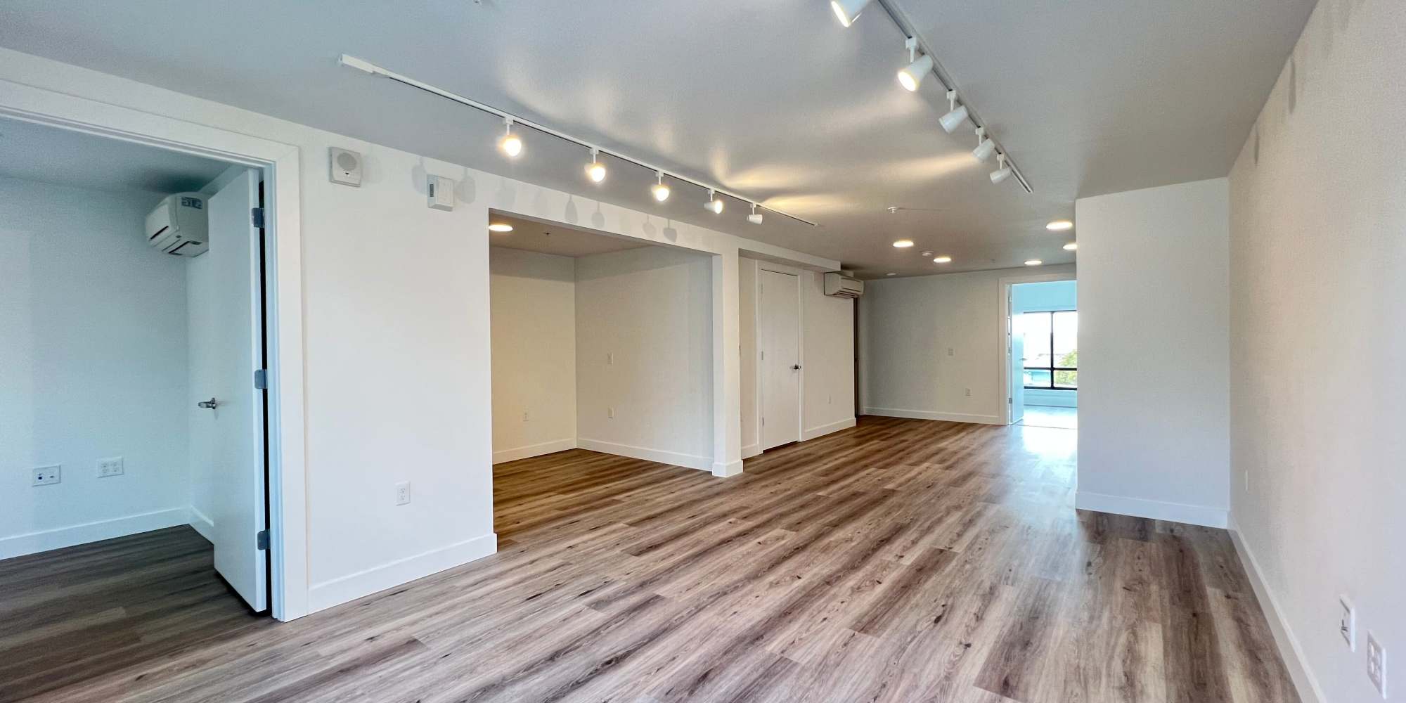 Spacious apartment with wood-style flooring at 1919 Market Street in Oakland, California