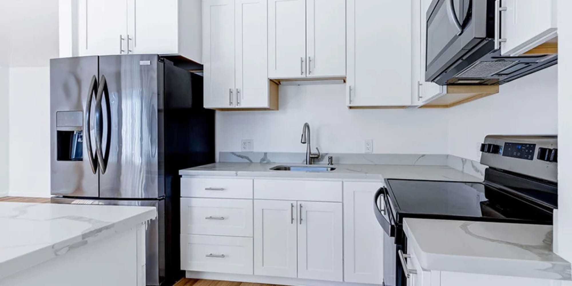 An upgraded kitchen with stainless-steel appliances and an island at Silverado Gardens in Napa, California