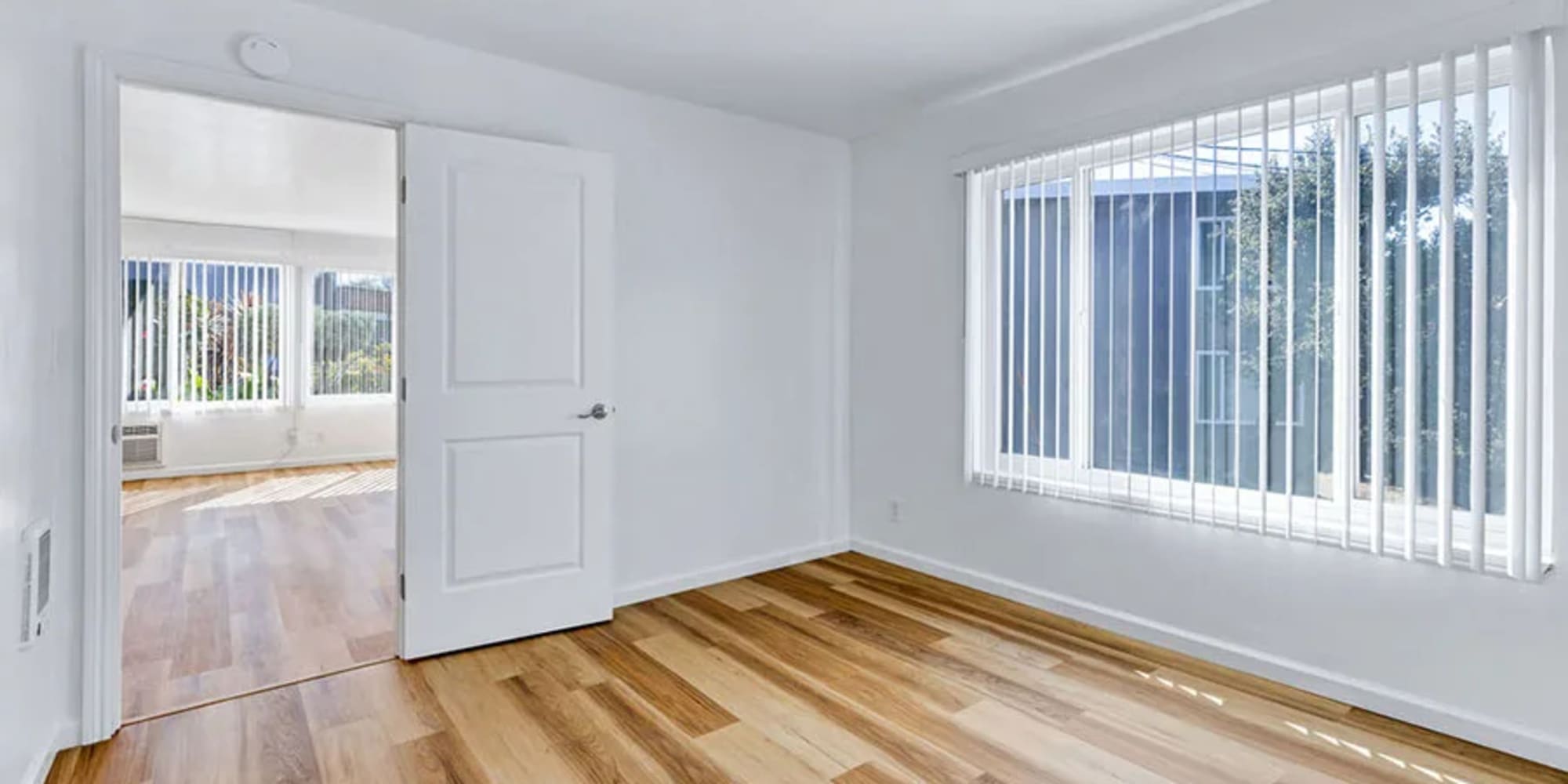 An open door to an apartment bedroom at Silverado Gardens in Napa, California