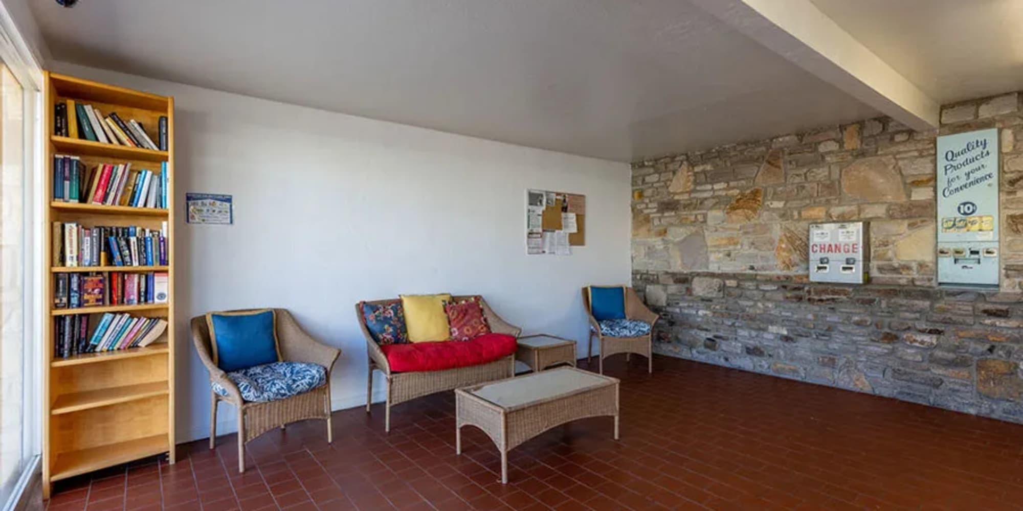 Comfortable seating and a bookshelf in the clubhouse at Silverado Gardens in Napa, California