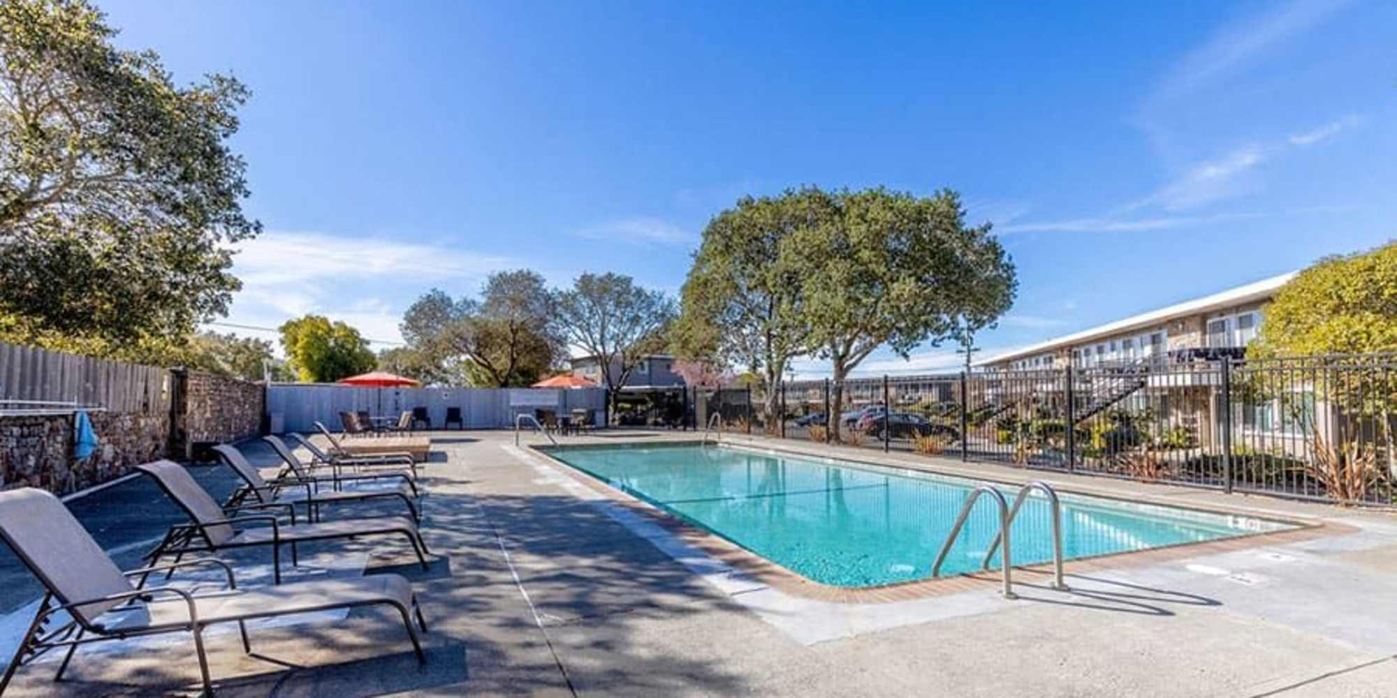 Lounge seating around the community swimming pool at Silverado Gardens in Napa, California