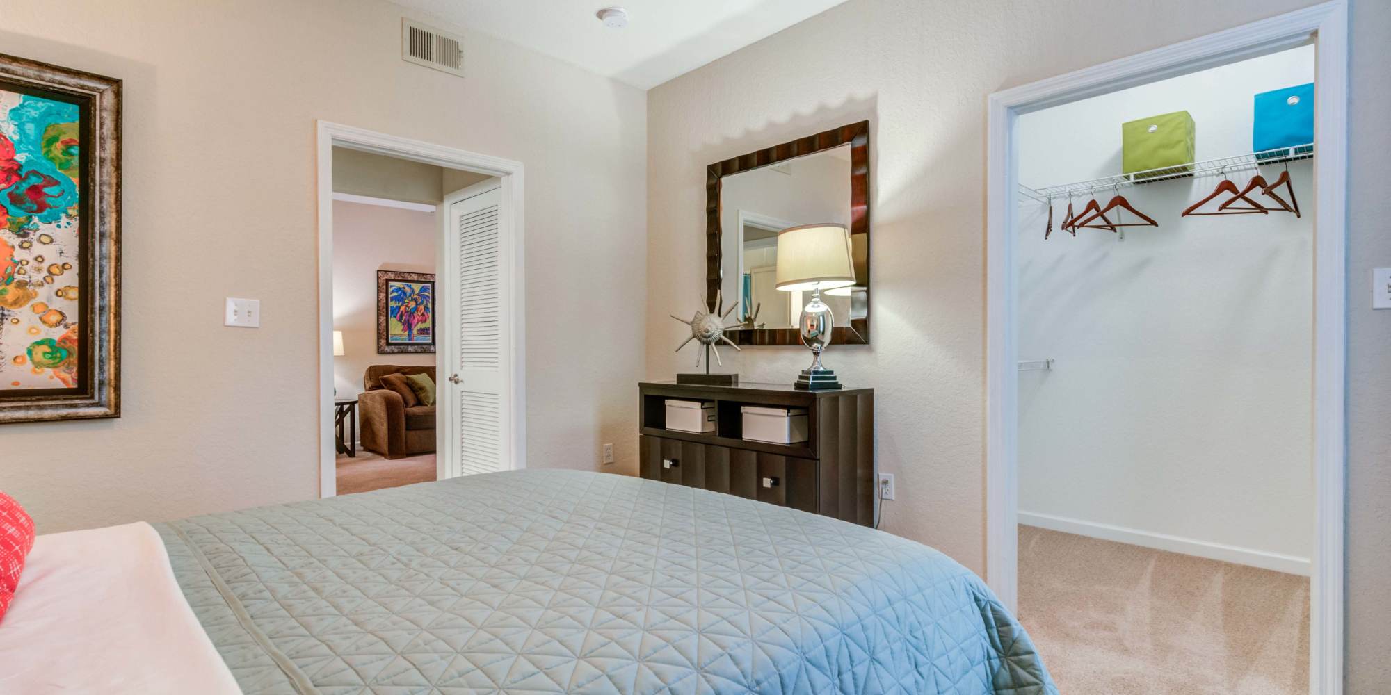 Bedroom with walk-in closet at Sole at Citrus Park in Tampa, Florida