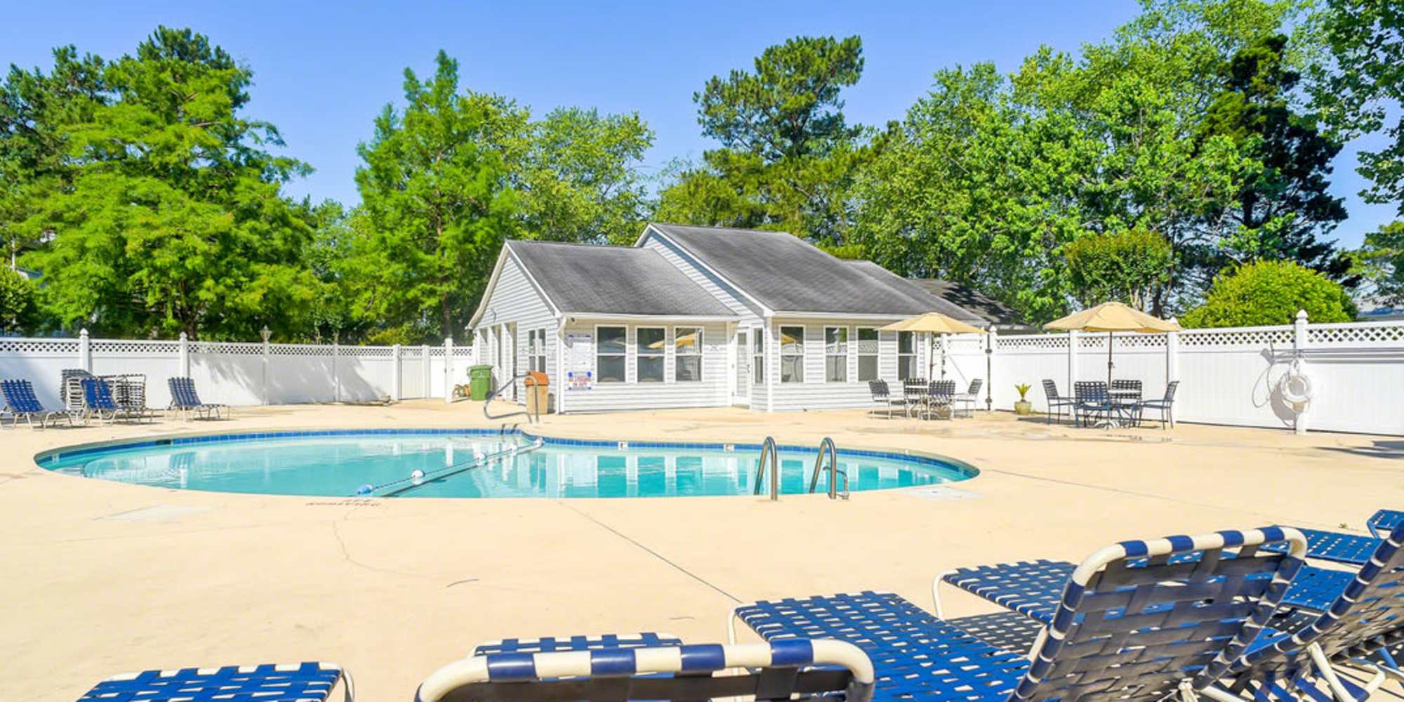 Outdoor pool at Home at Sand Ridge in Wilmington, North Carolina