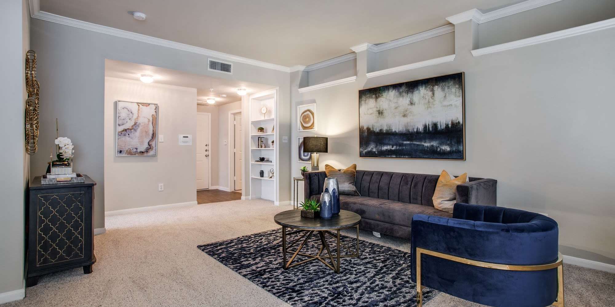 furnished model living room at Arboretum Estates in Richardson, Texas