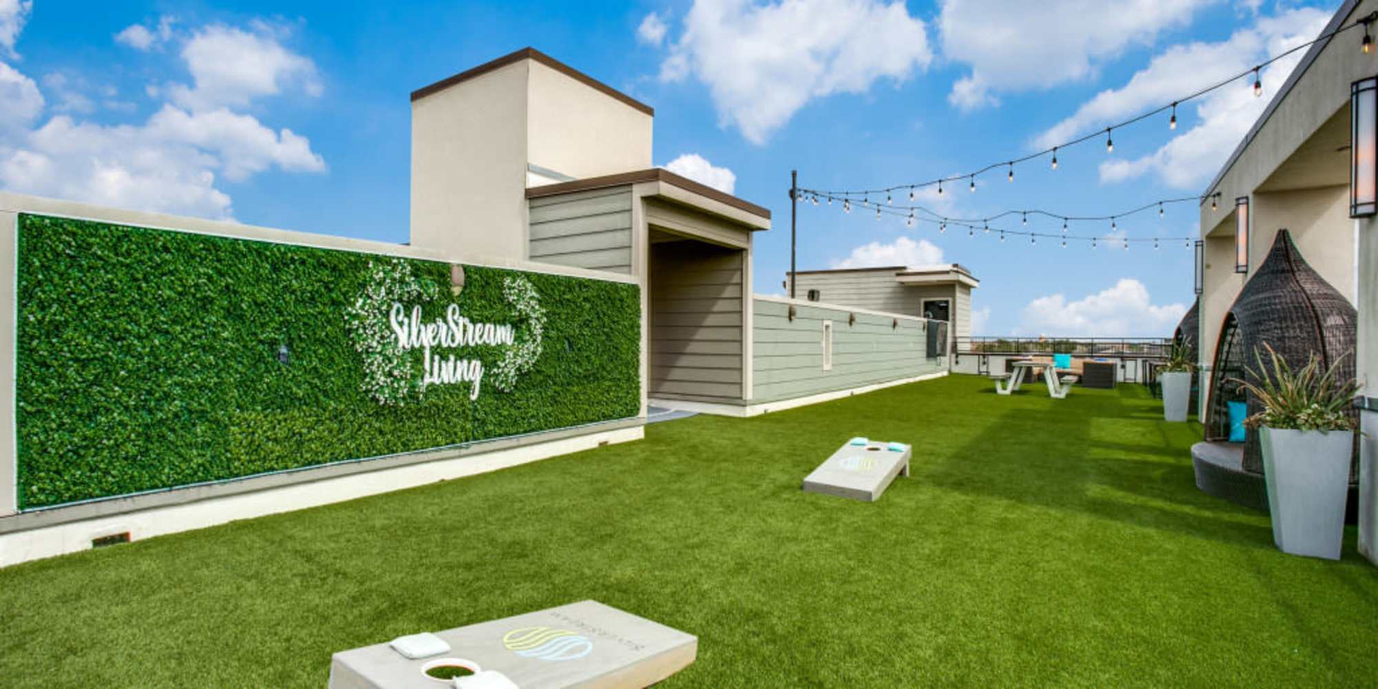 rooftop lounge and cornhole area at Silverstream in Katy, Texas