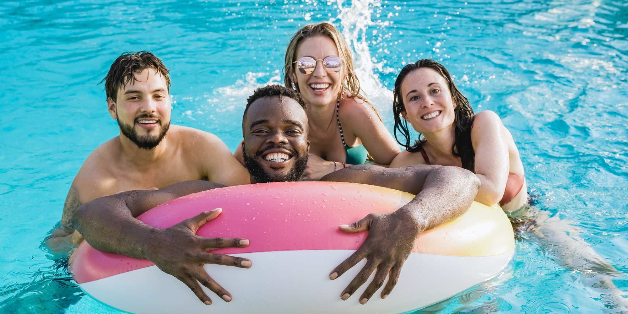 A group of residents in the swimming pool at Copper Range in Colorado Springs, Colorado
