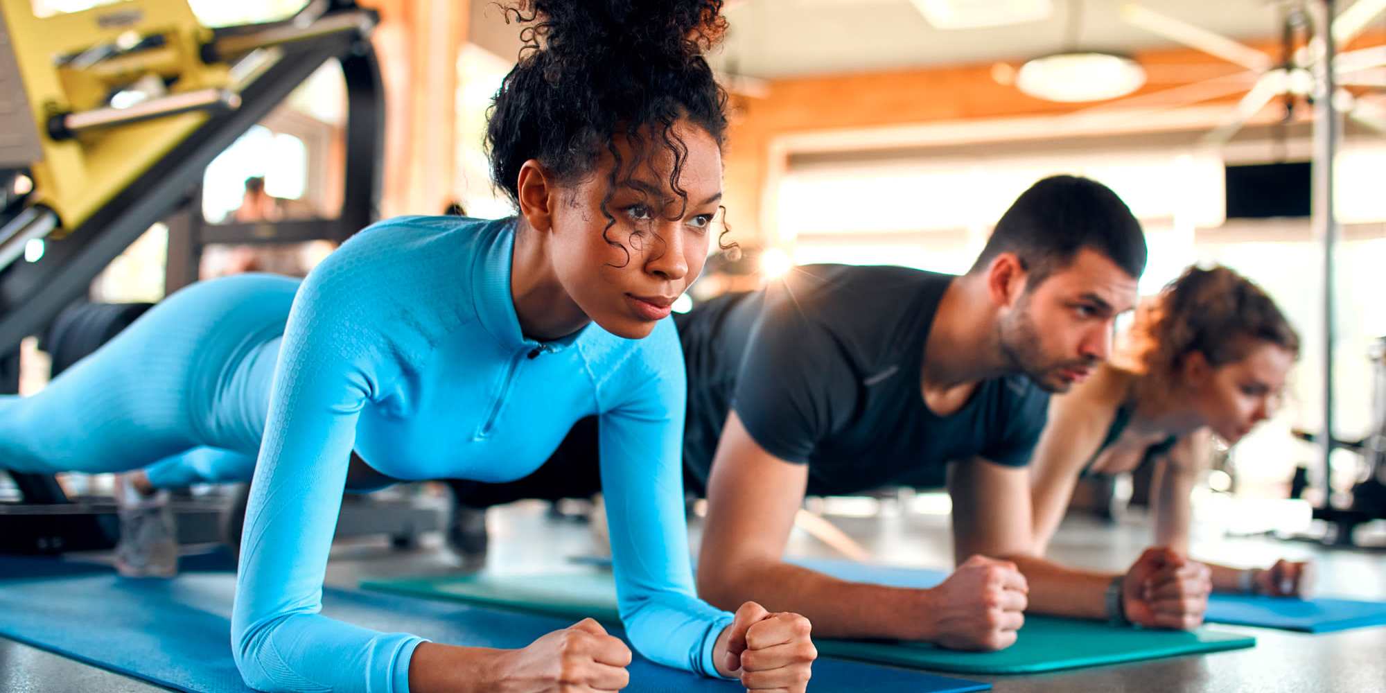 A group of residents working out in the fitness center at Copper Range in Colorado Springs, Colorado