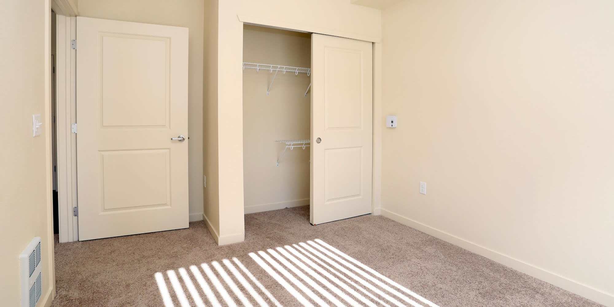 Bedroom with walk-in closet at Traditions at Colorado Springs in Colorado Springs, Colorado