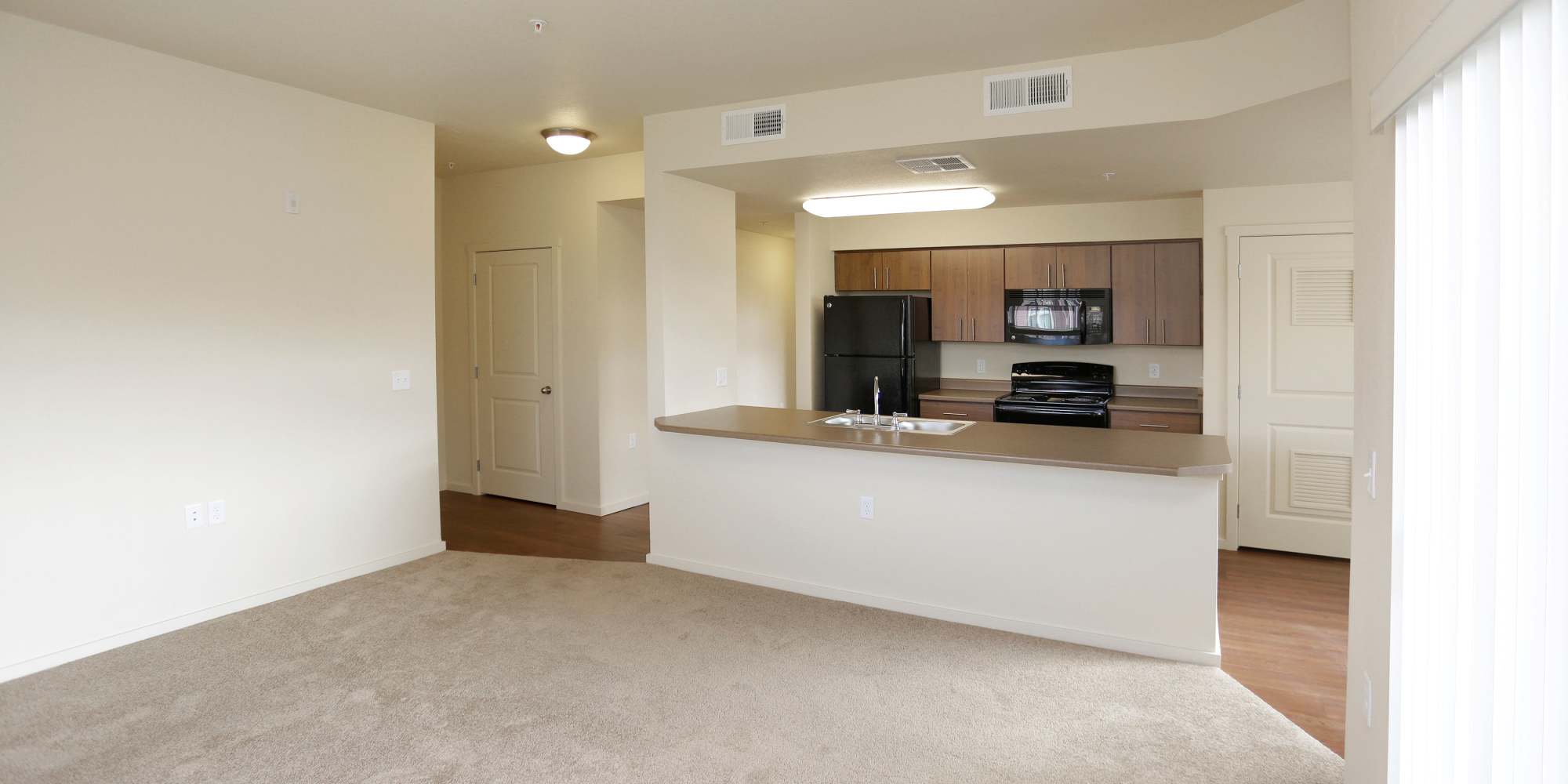 Kitchen and living room at Copper Creek in Colorado Springs, Colorado