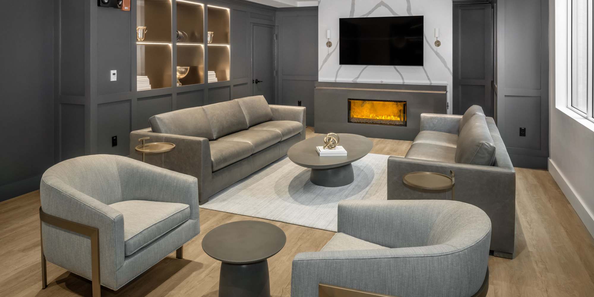Fireplace and seating area in the clubhouse at Parkside Place in Cambridge, Massachusetts