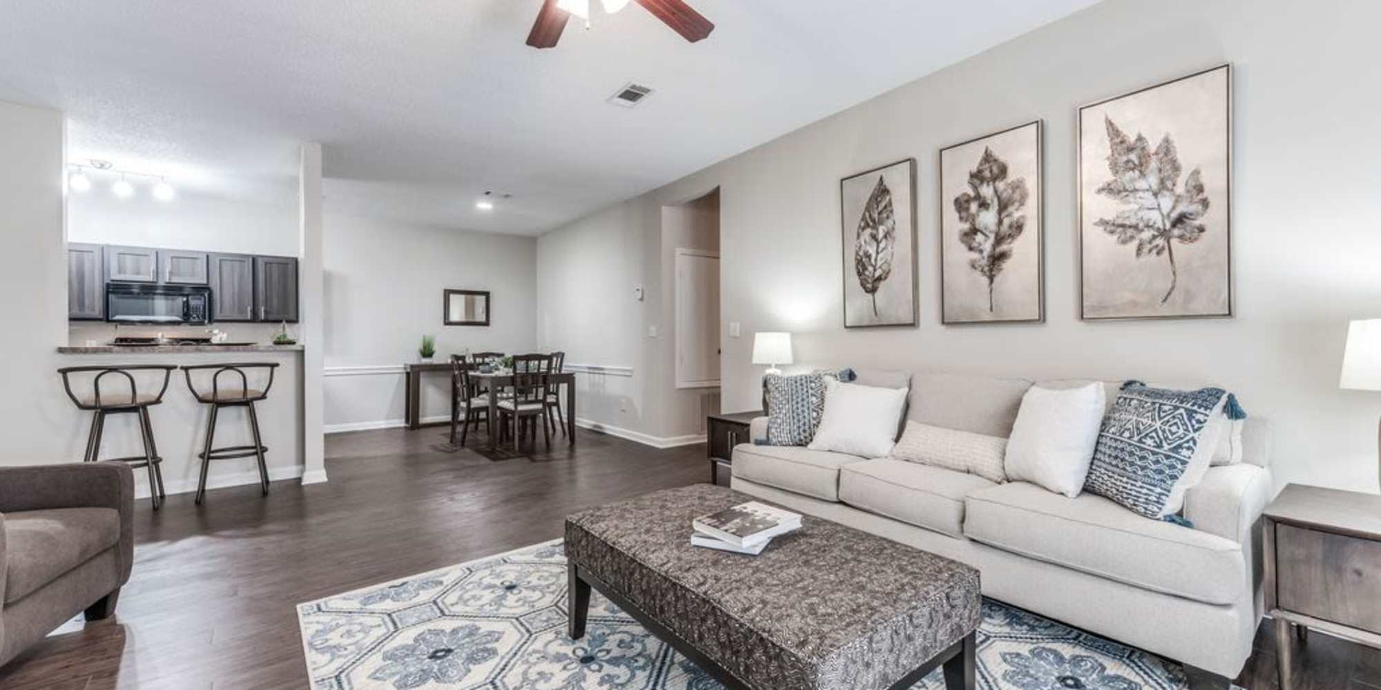 Modern furnished living room at The Landings of Conroe in Conroe, Texas