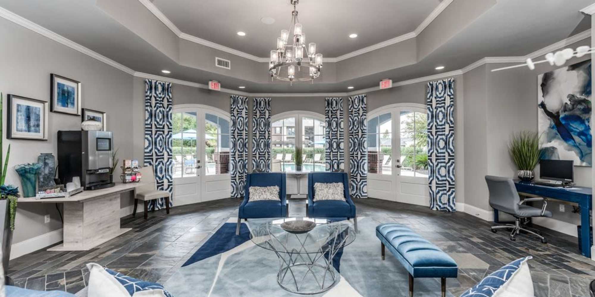 modern clubhouse with blue accents at The Landings of Conroe in Conroe, Texas