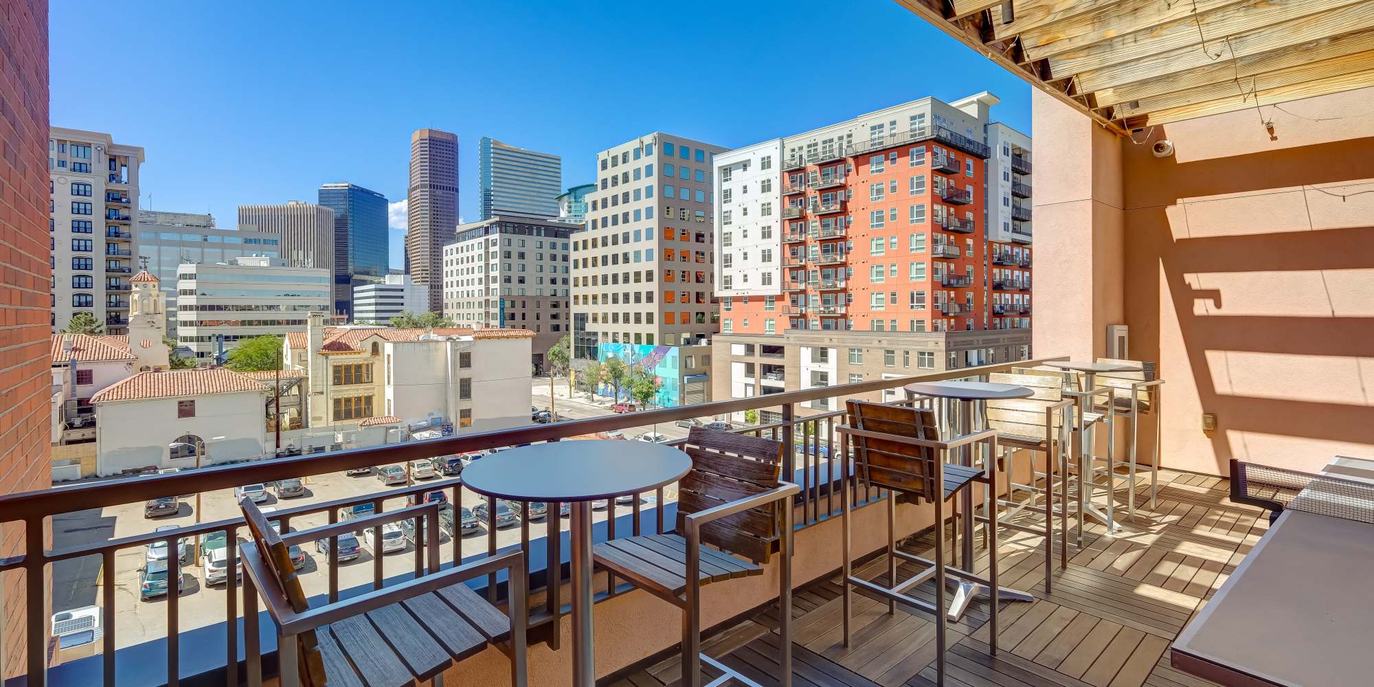 Deck with view of the city skyline at One City Block in Denver, Colorado