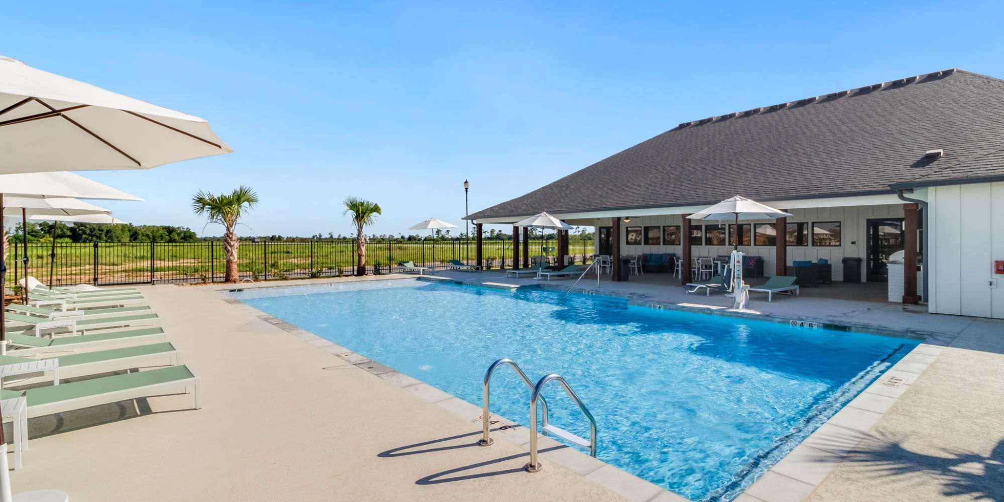 Our swimming pool at Cottages at Sugar Mill Pond in Youngsville, Louisiana