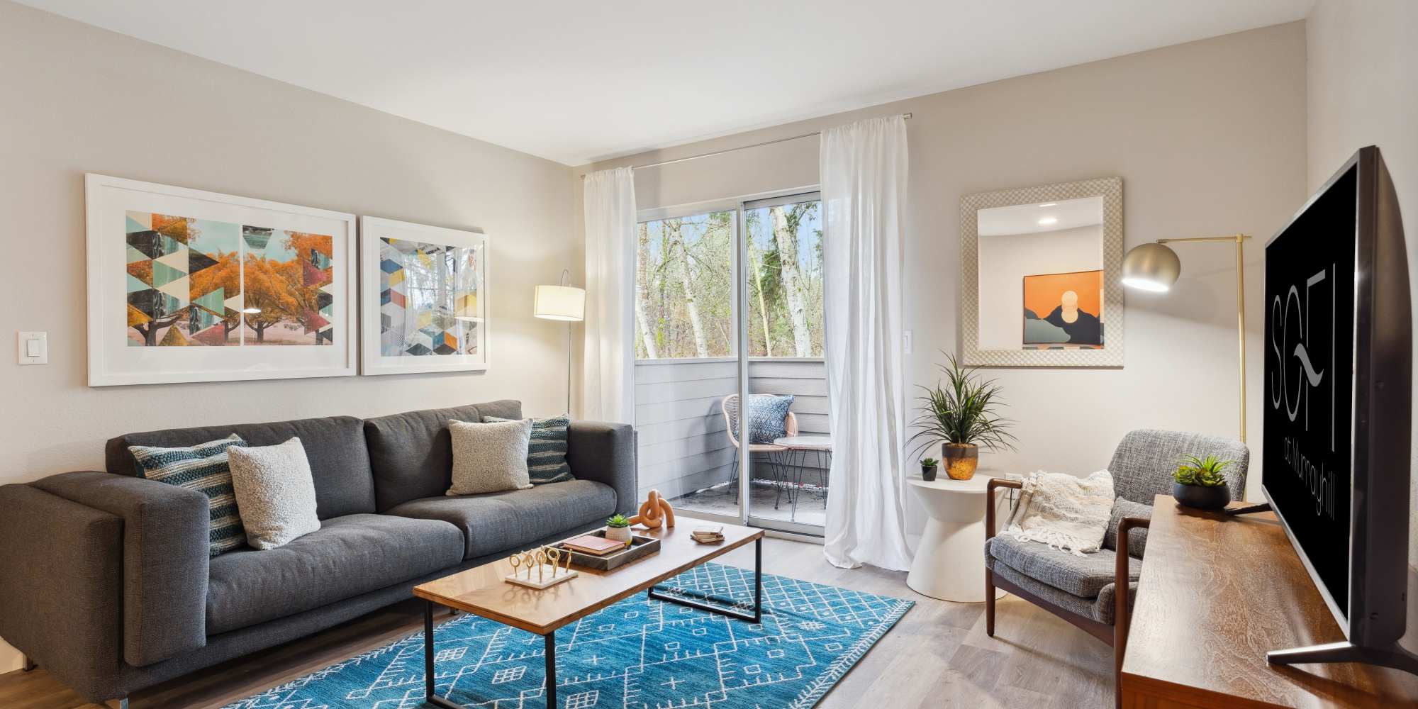 Spacious Living Room with Private Balcony at Sofi at Murrayhill in Beaverton, Oregon
