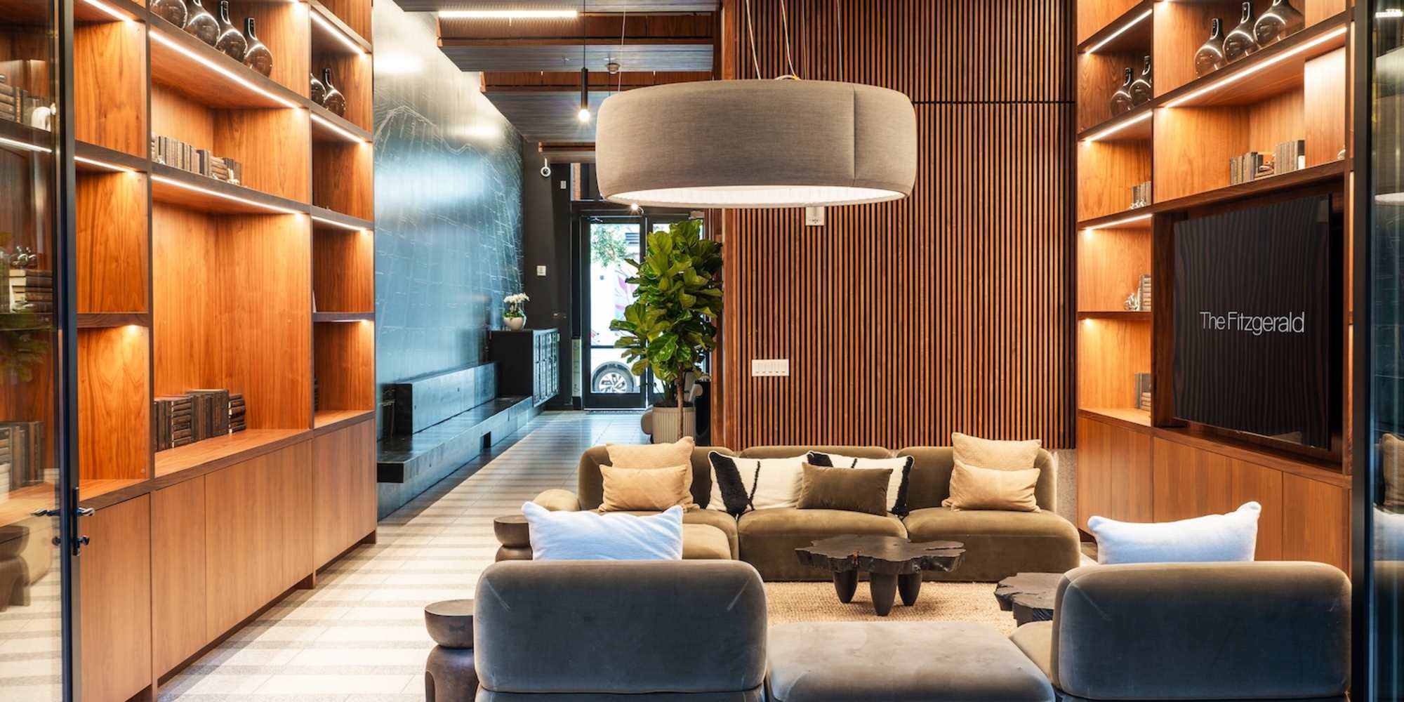 Resident lounge with a TV at The Fitzgerald in San Francisco, California