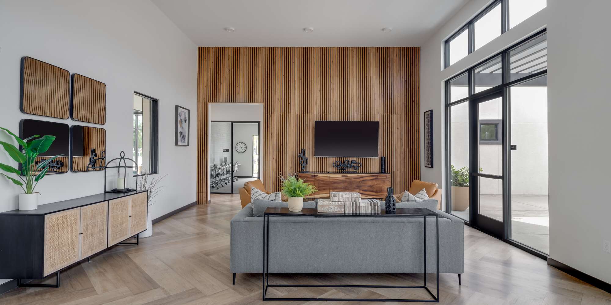 Resident clubhouse with TV at Village at First in Gilroy, California